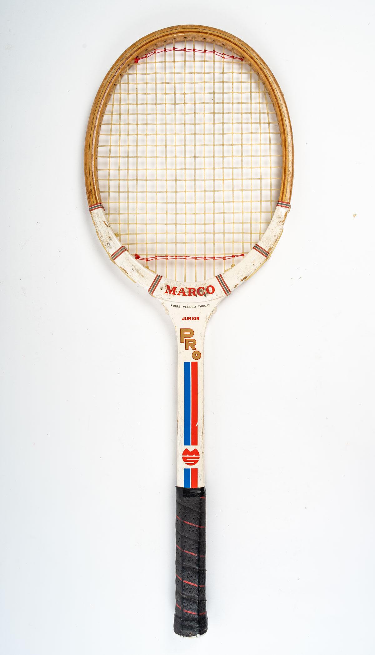 Marco tennis racket, Junior Pro, 1970.

Measures: H: 64 cm, W: 22 cm, D: 3 cm.