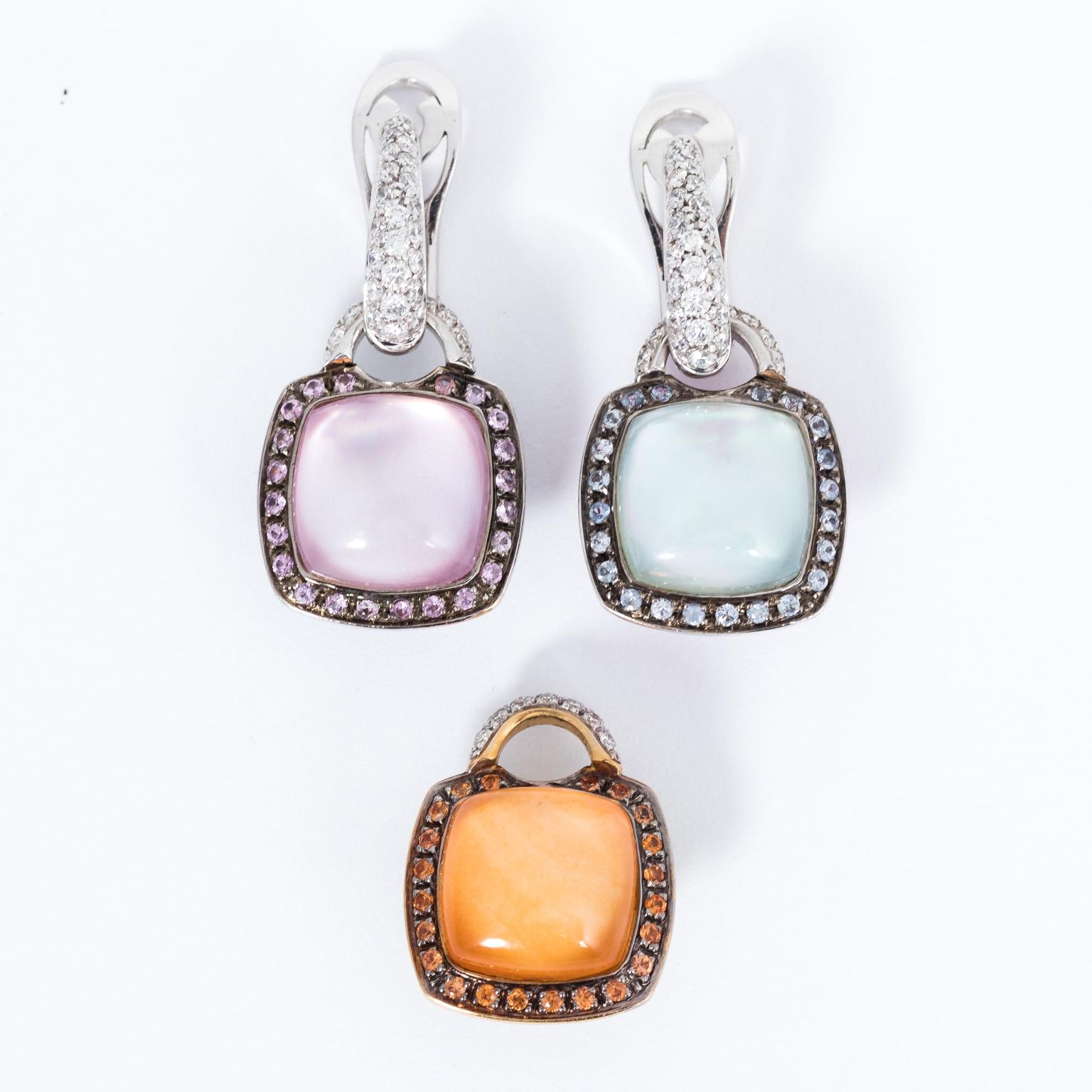 Pair of two sugar loaf shaped quartz earrings in orange, blue, and pink. The clip on earrings are set with brilliant cut diamonds and can be removed from the earring pendants. The earring pendants are 16 X 21 mm and are set with matching colored