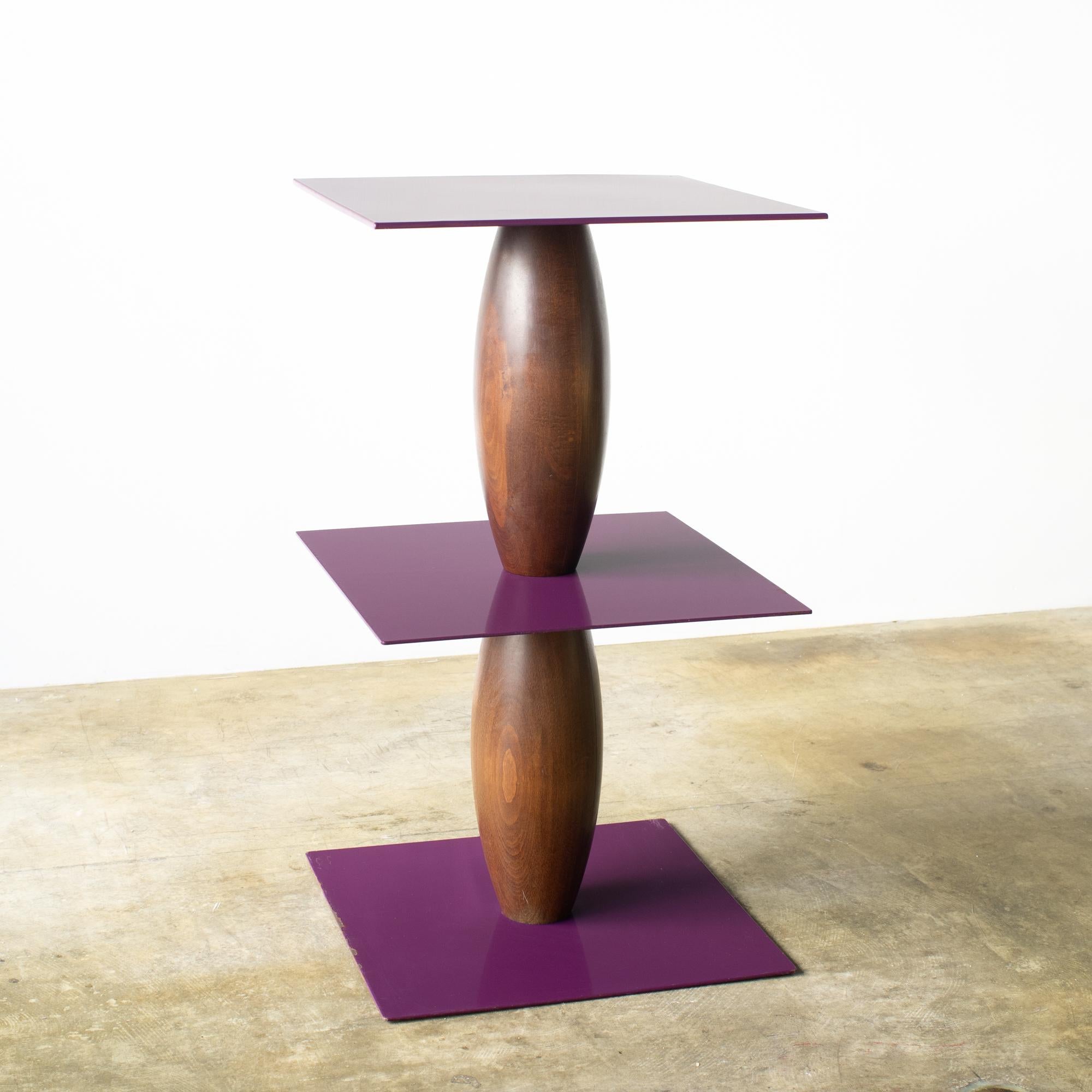 Zanzibar side table designed by Marco Zanini for Bieffeplast. Marco Zanini designed 12 side tables for Bieffeplast around the late 80s. This is one of 12 varietions that Bieffeplast released in those days. 

Plates are made of painted steel. Pole is