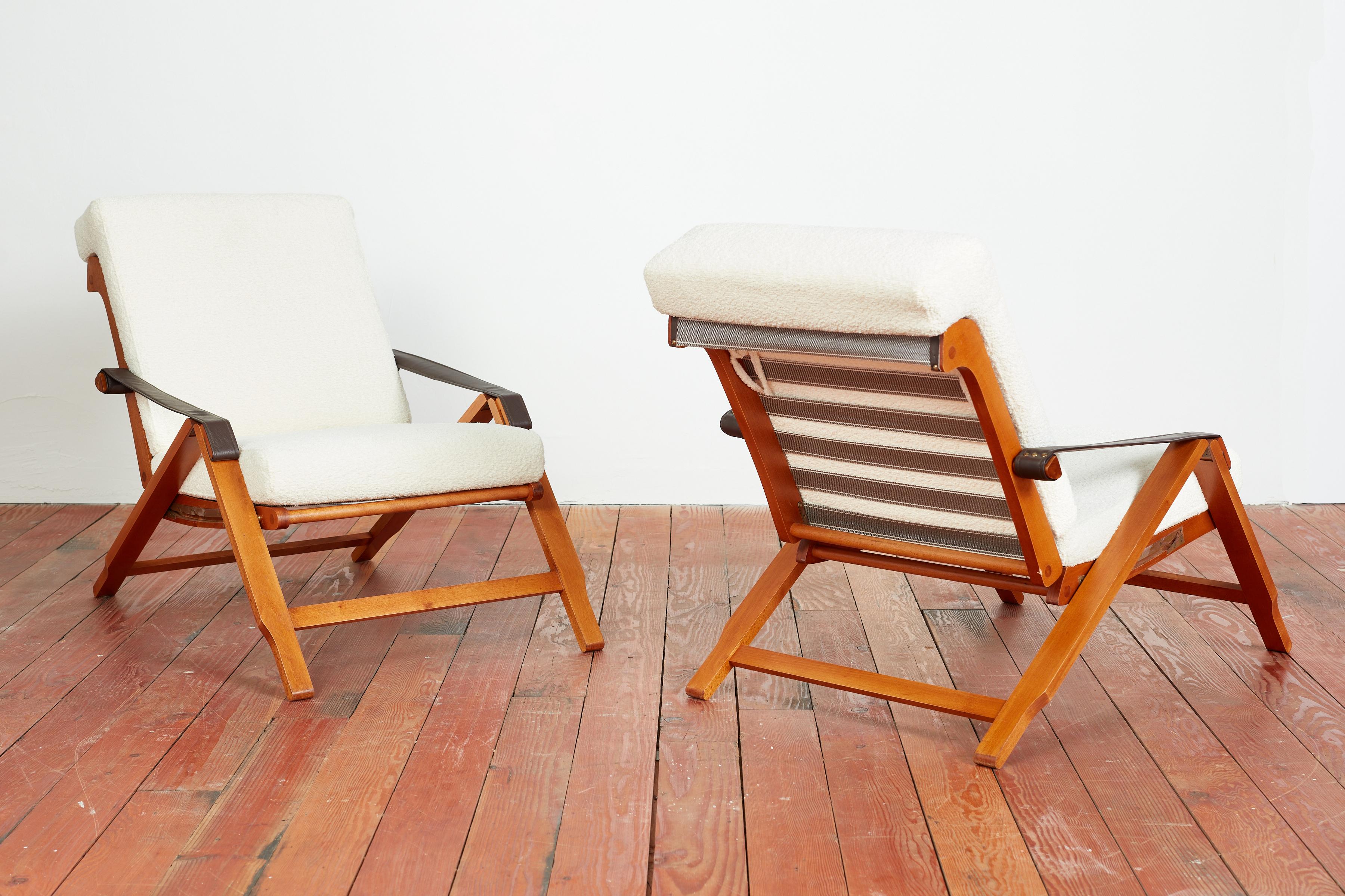 Marco Zansuo adjustable armchairs - Italy 1960's

Chairs have wooden L-shape base with an inlayed brass mechanism on the side that can recline seat into four different positions. 

Original leather armrests and newly upholstered seats in creamy