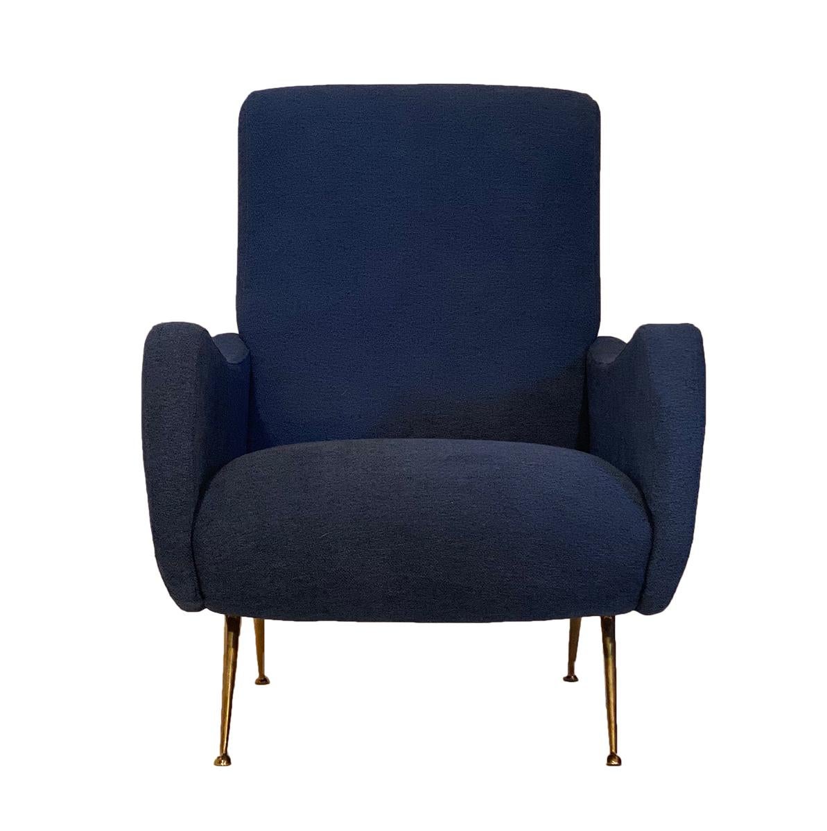 Pair of Marco Zanuso blue armchairs from Italy. This pair by Zanuso is upholstered in a midnight blue chenille blend. They have solid gilt brass feet and excellent comfort.