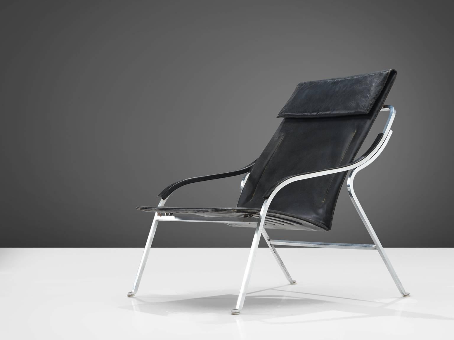 Marco Zanuso for Arflex, fourline lounge chair, black leather and steel, Italy, 1964.

This lounge chair by Zanuso remains among the best examples of armchairs designed by the architect. It is not only the ingenious slender design that distinguishes