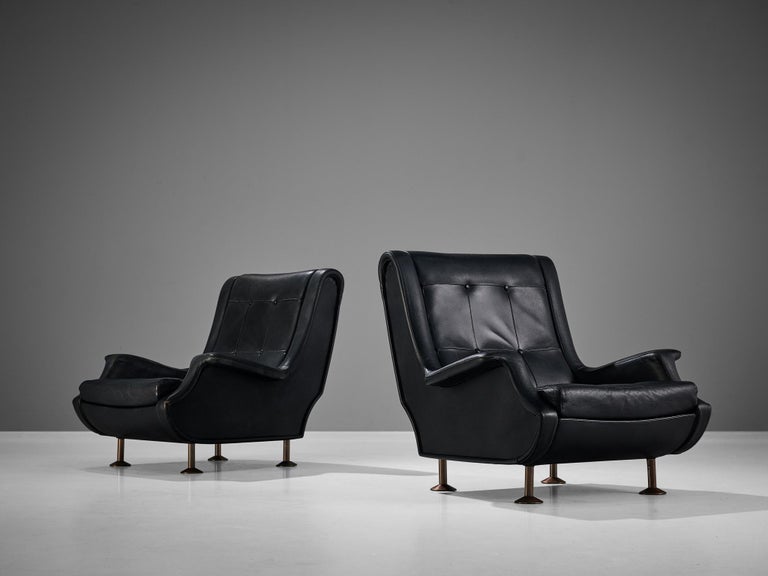 Marco Zanuso for Arflex, pair of lounge chairs, model 'Regent', leather, metal, Italy, designed in 1960

Admirable pair of ‘Regent’ lounge chairs designed by Marco Zanuso in 1960. Characteristic for this model are the outwards pointing armrests