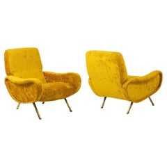 Marco Zanuso pour Artflex. Fauteuils en laiton jaune et doré. 1950s.