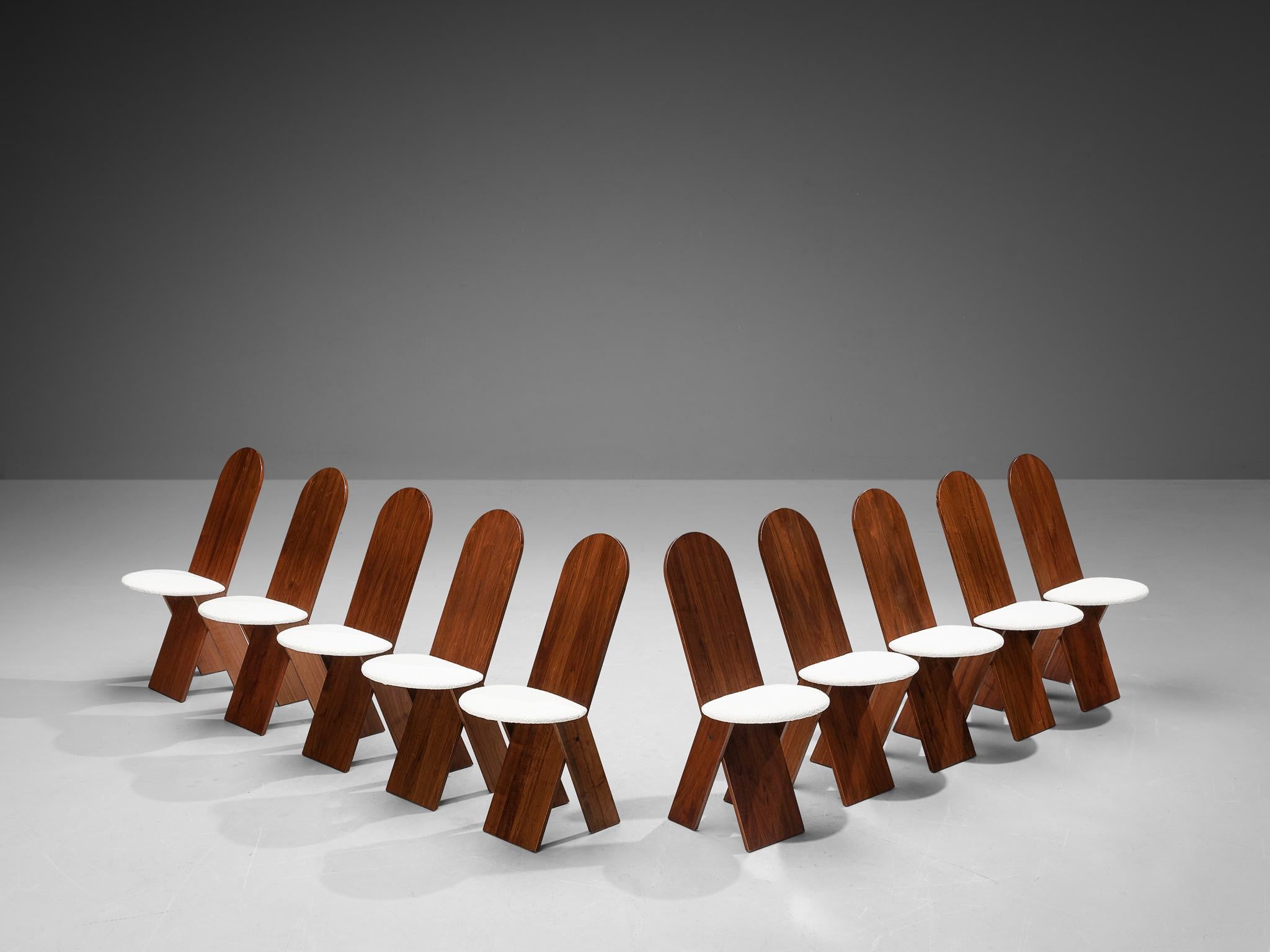 Marco Zanuso for Poggi, set of ten dining chairs, model SD 57, walnut and fabric, Italy, 1973.

Elegant and sleek set of ten dining chairs designed by Italian designer Marco Zanuso. These chairs have a wonderful structure and monumental appearance.