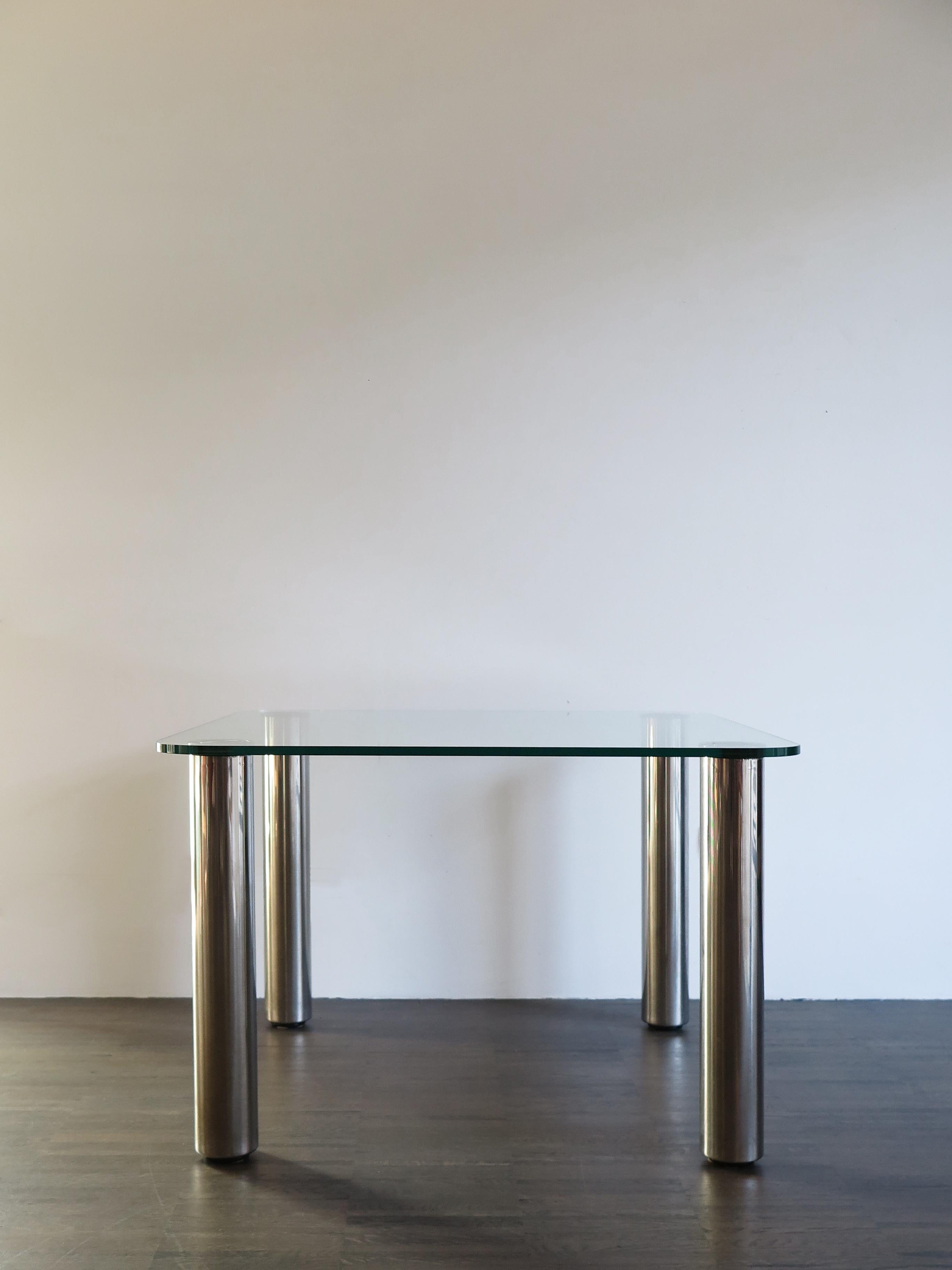 Italian midcentury dining table model Marcuso designed by Marco Zanuso and produced by Zanotto since 1969 with thick glass top and stainless steel legs.
Zanotta trademark engraved on the legs.

Nominated for the Compasso d’Oro