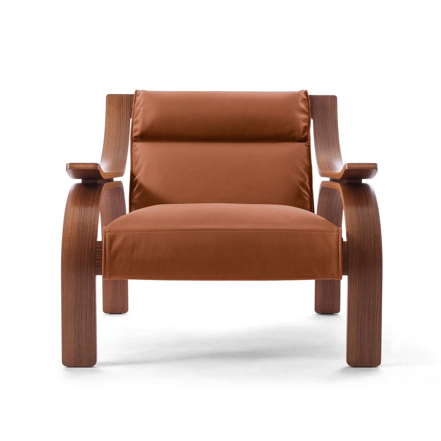 Woodline armchair designed by Marco Zanuso in 1964, relaunched in 2015.

Leather and stained walnut wood.

Manufactured by Cassina in Italy.

An armchair with a striking, rigorous design, the outcome of research by Marco Zanuso on how to