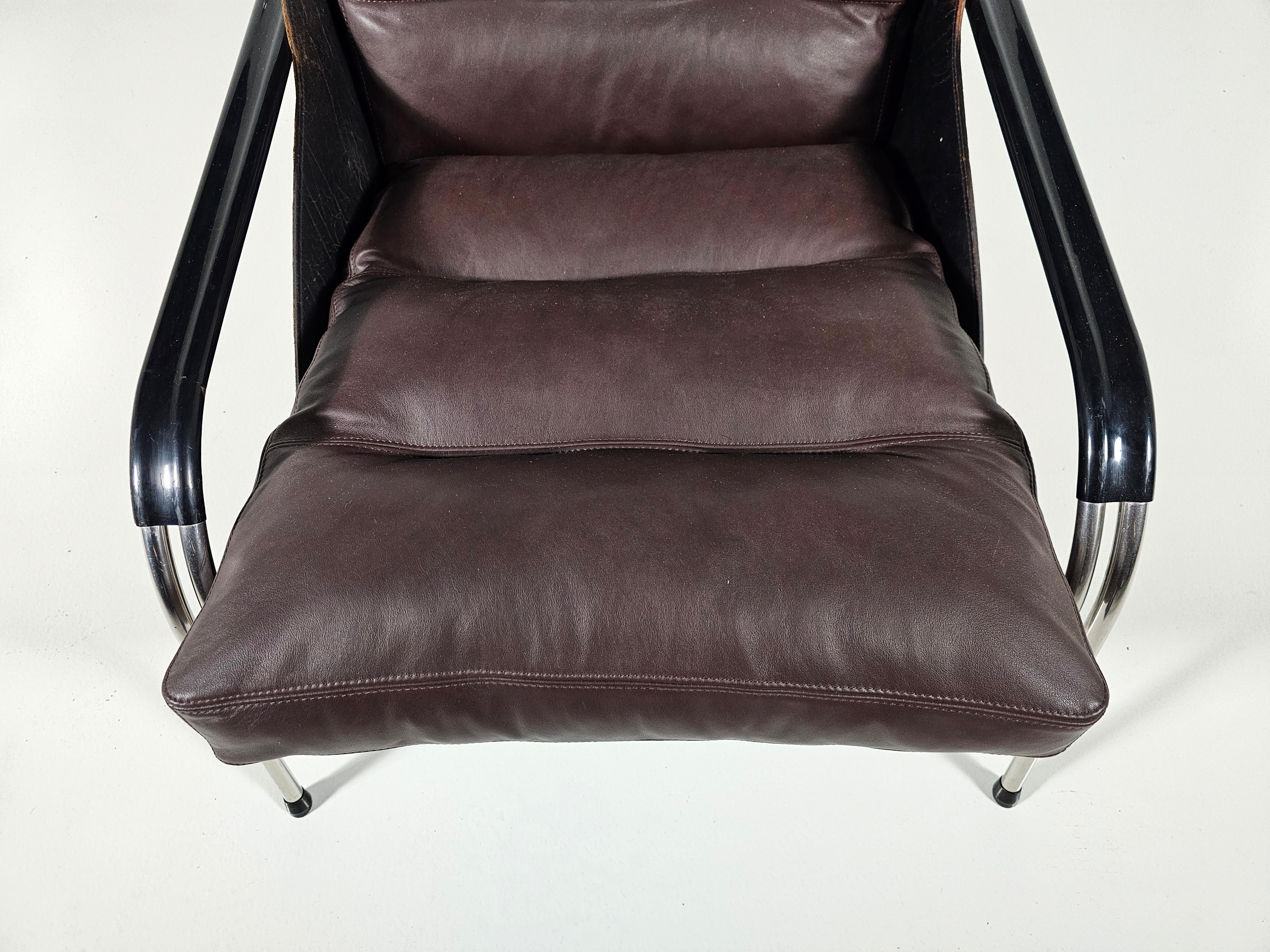 Steel  Marco Zanuso Maggiolina lounge chairs in brown and black leather, Zanotta, 1950