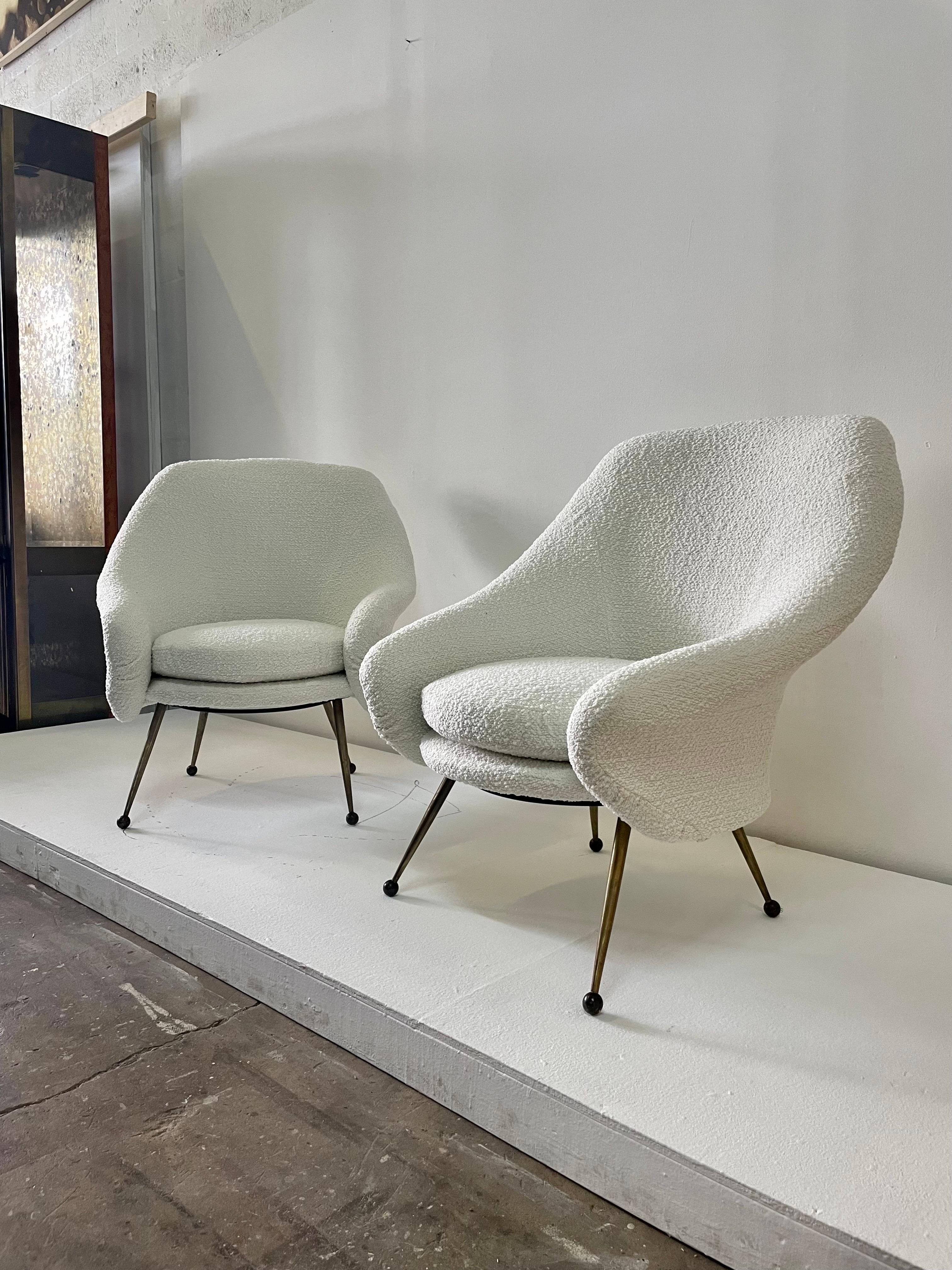 These are a pair of beautiful reupholstered Zanuso chairs with luxurious boucle fabric - ready to place in your high design space.