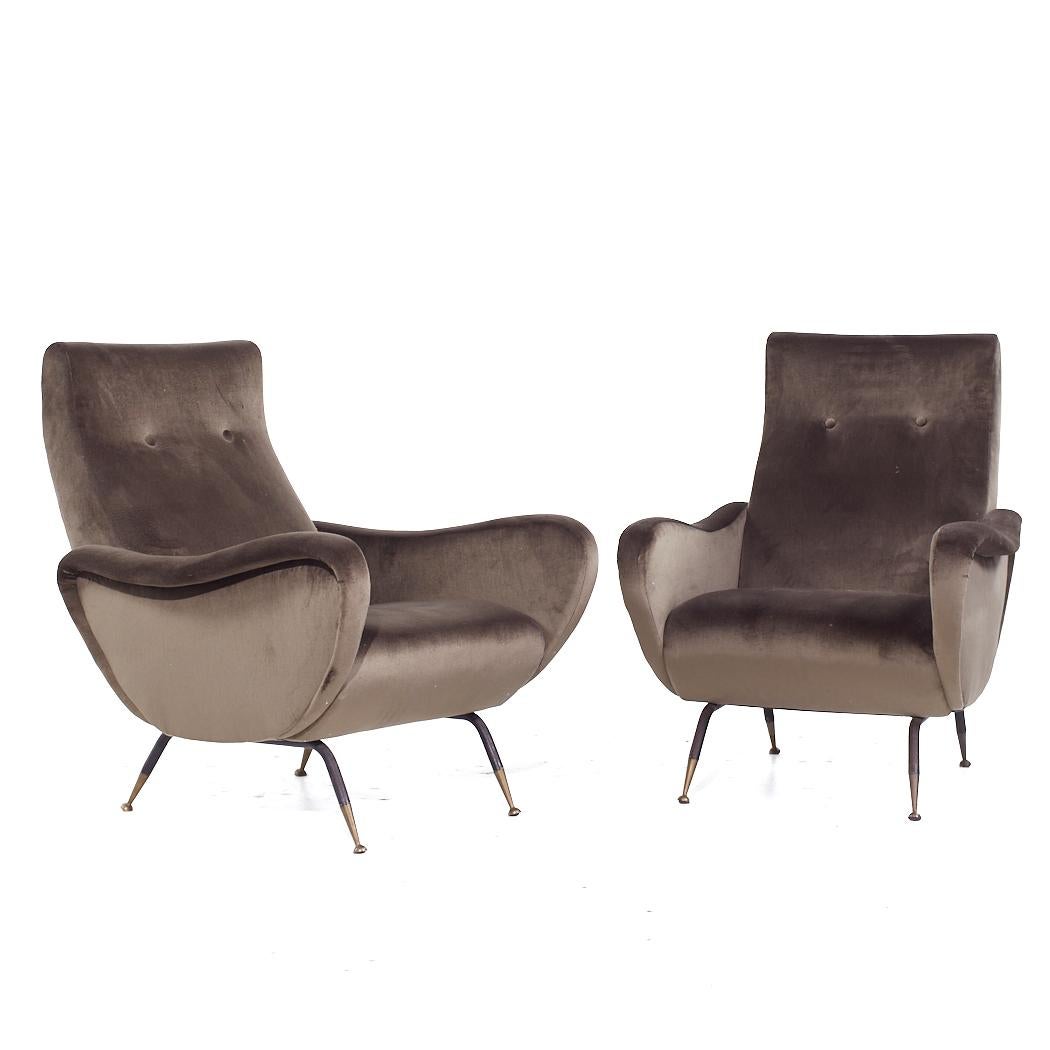 Marco Zanuso Mid Century Lady Lounge Chair - Pair

Each lounge chair measures: 29 wide x 36 deep x 36.5 high, with a seat height of 16 and arm height/chair clearance 22.5 inches

We take our photos in a controlled lighting studio to show as much