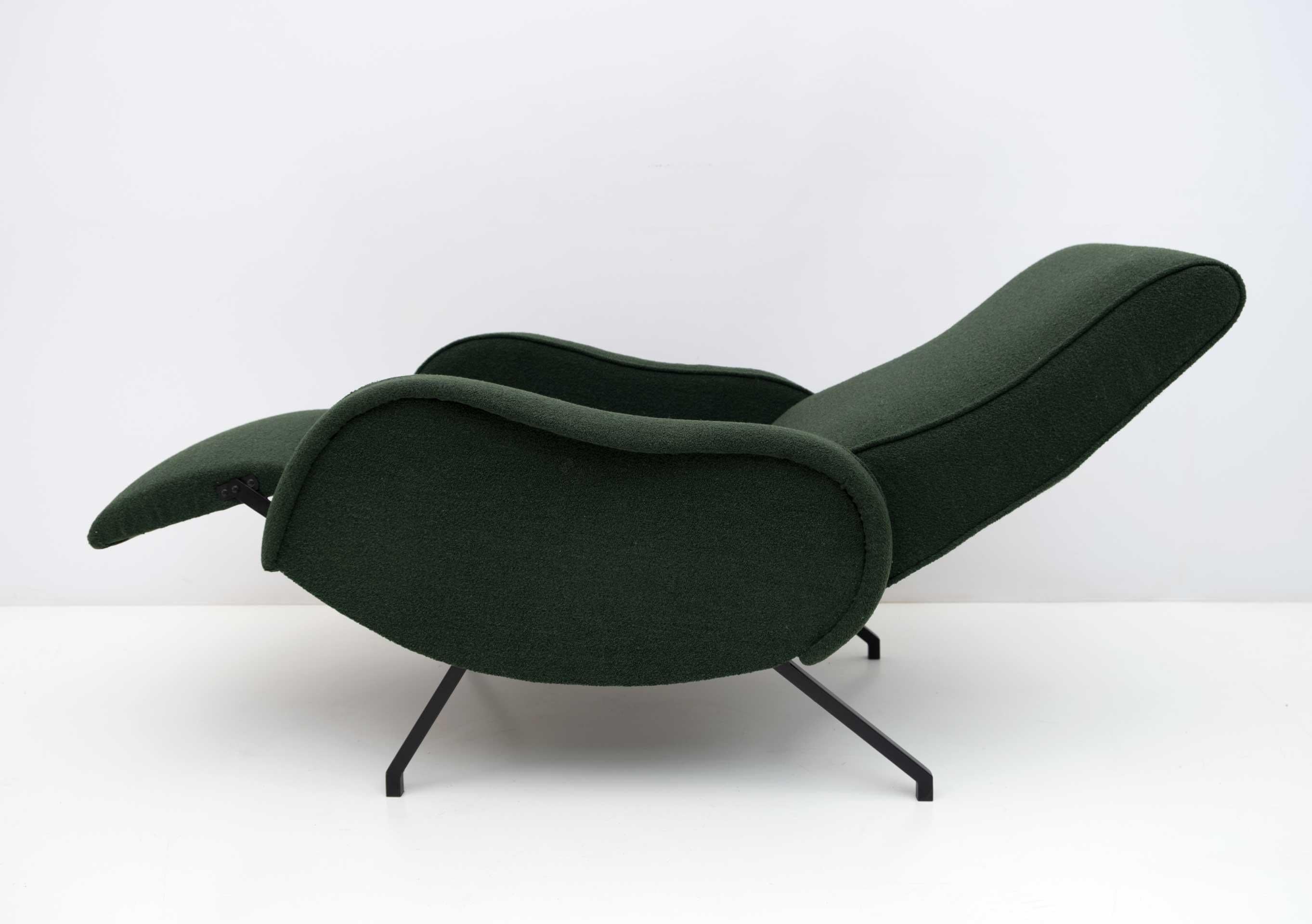 Reclining armchair designed by Marco Zanuso in the 1950s, the armchair has been restored and upholstered in English green Bouclè fabric

The extended armchair measures 150 cm.
