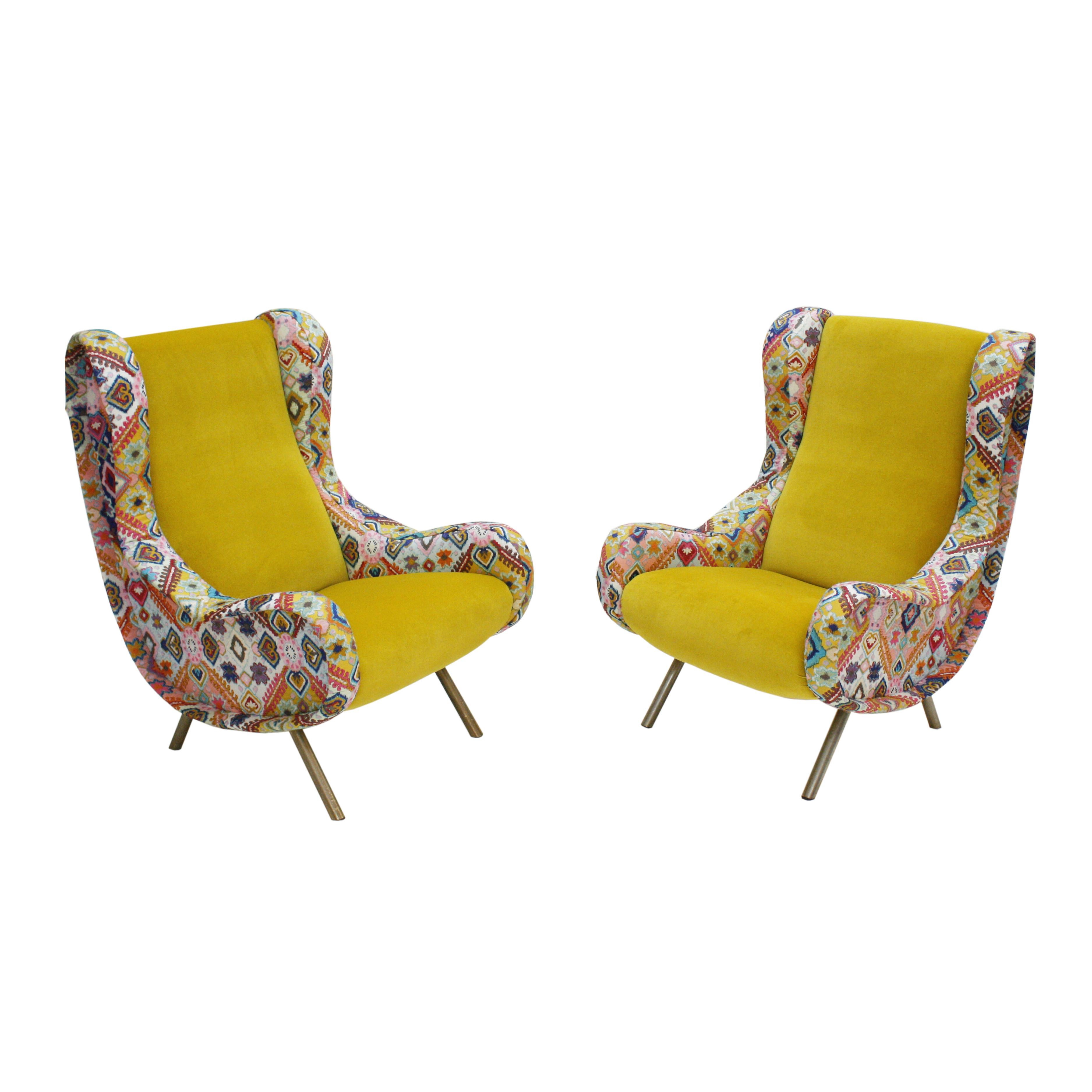 Pair of Italian armchairs designed by Marco Zanuso (1916-2001 Milán) model Senior, edited by Arflex. Made of solid wood structure and brass legs. Upholstered in yellow cotton velvet designed by India Madhavi and embroidery pattern fabric model