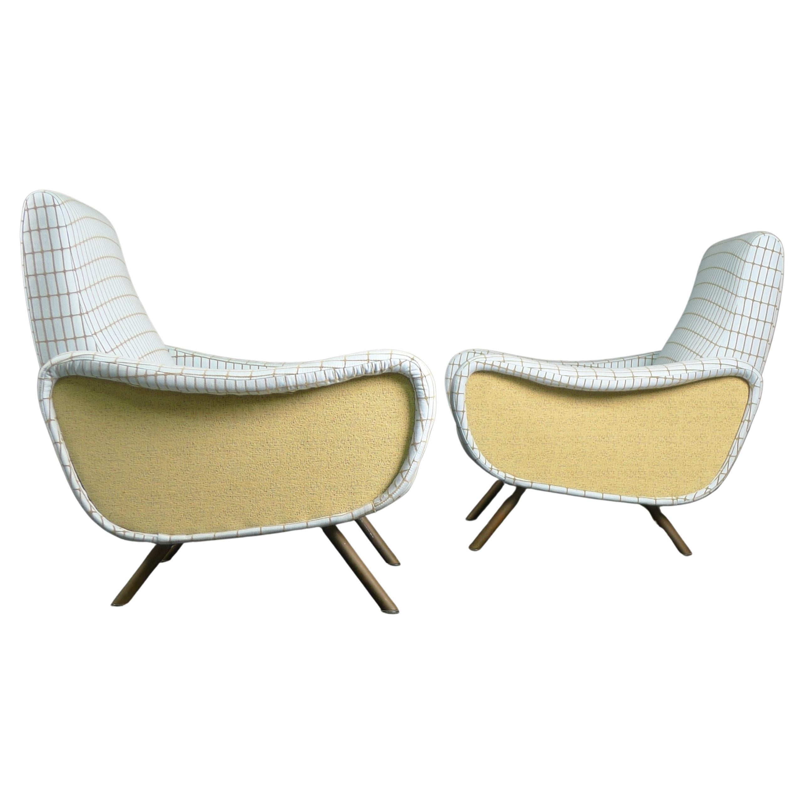 Marco Zanuso, Pair of Lady Chairs, manufactured by Arflex, Italy, mid 1950s

This midcentury Classic design was awarded the Gold Medal in the 1951 Milan Triennale. 

Reupholstered in Svensson fabric.