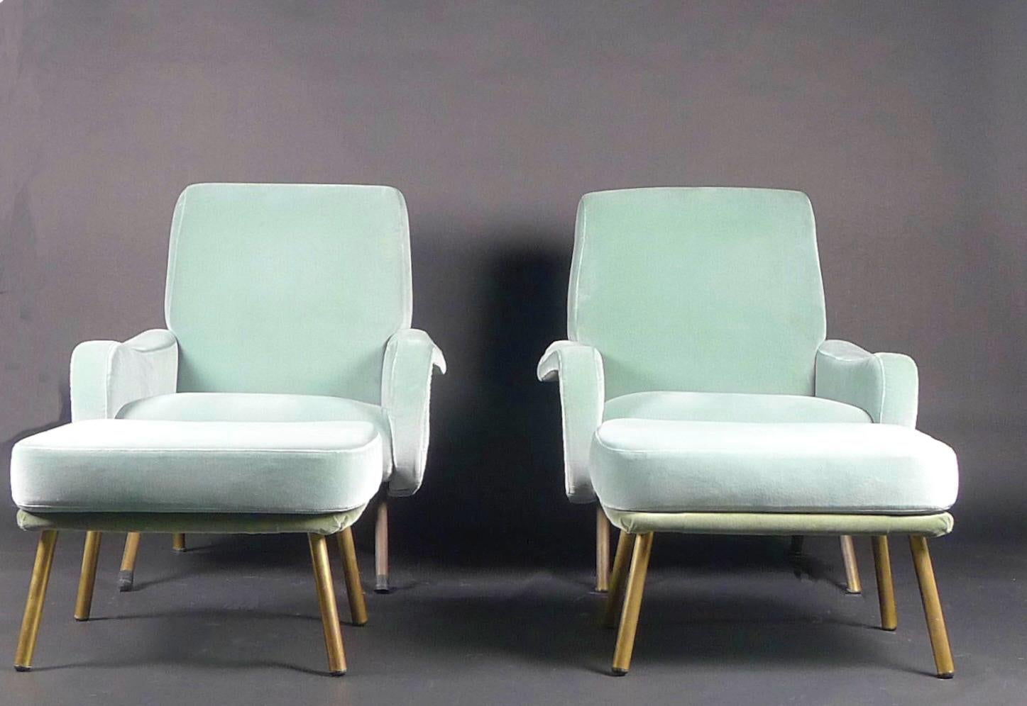 Marco Zanuso, Pair of Lady Chairs and Ottomans, manufactured by Arflex, Italy, mid 1950s

This mid-Century classic design was awarded the gold medal in the 1951 Milan Triennale.

Newly upholstered in velour fabric, soft duck egg blue with