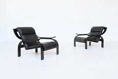Marco Zanuso pair of Woodline armchairs in black leather Arflex Italy 1964