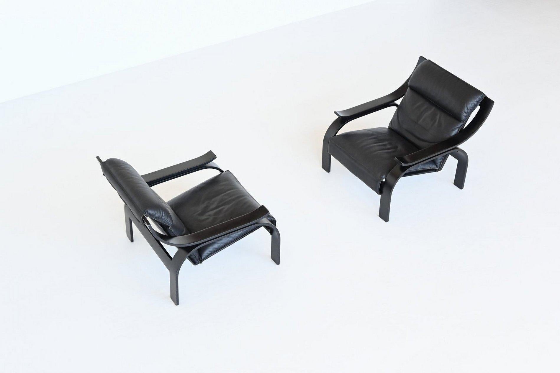 Italian Marco Zanuso pair of Woodline armchairs in black leather Arflex Italy 1964