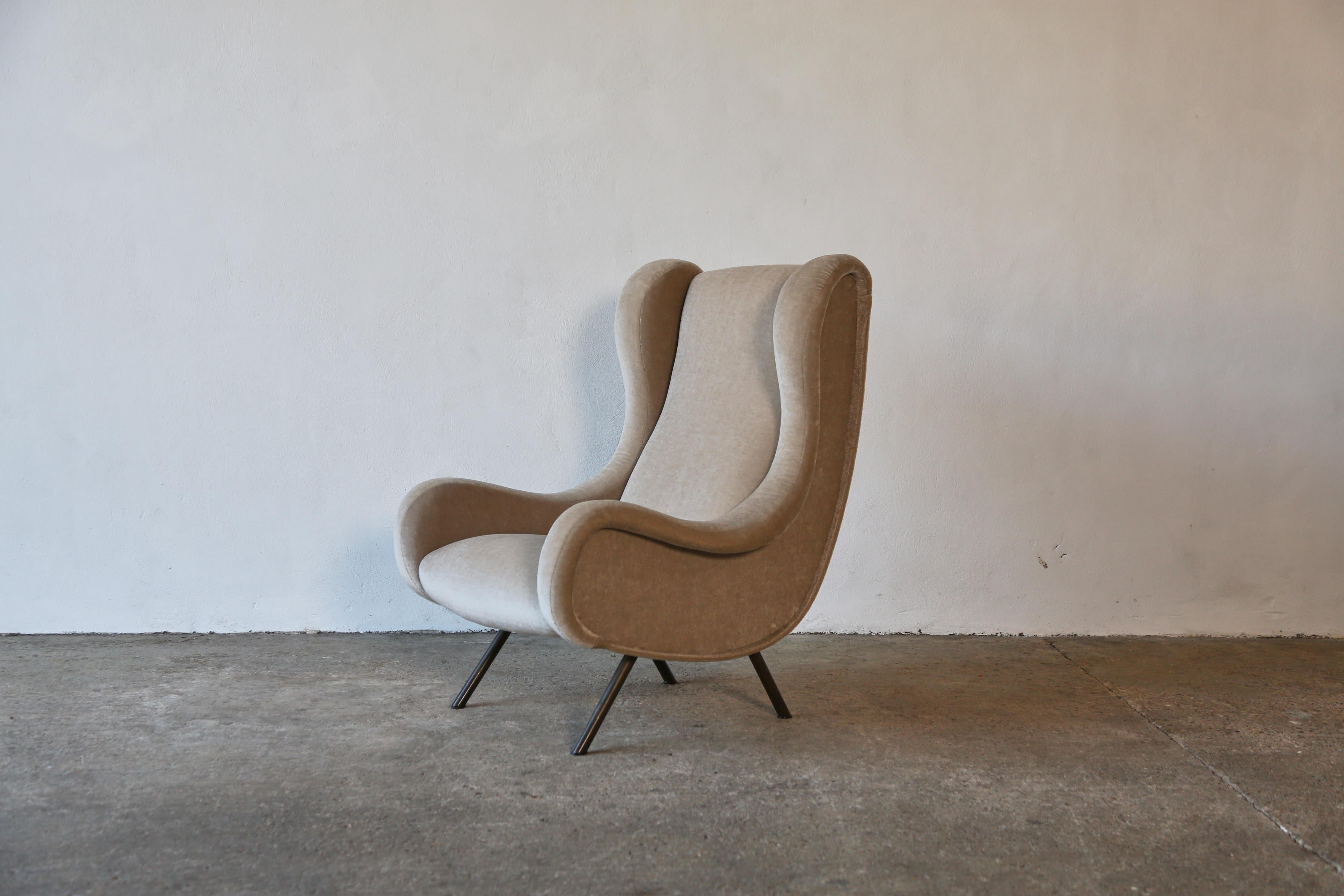 An authentic Marco Zanuso senior chair, Arflex, Italy, 1960s. Newly reupholstered in a premium, beige, pure mohair velvet. Fast shipping worldwide.





