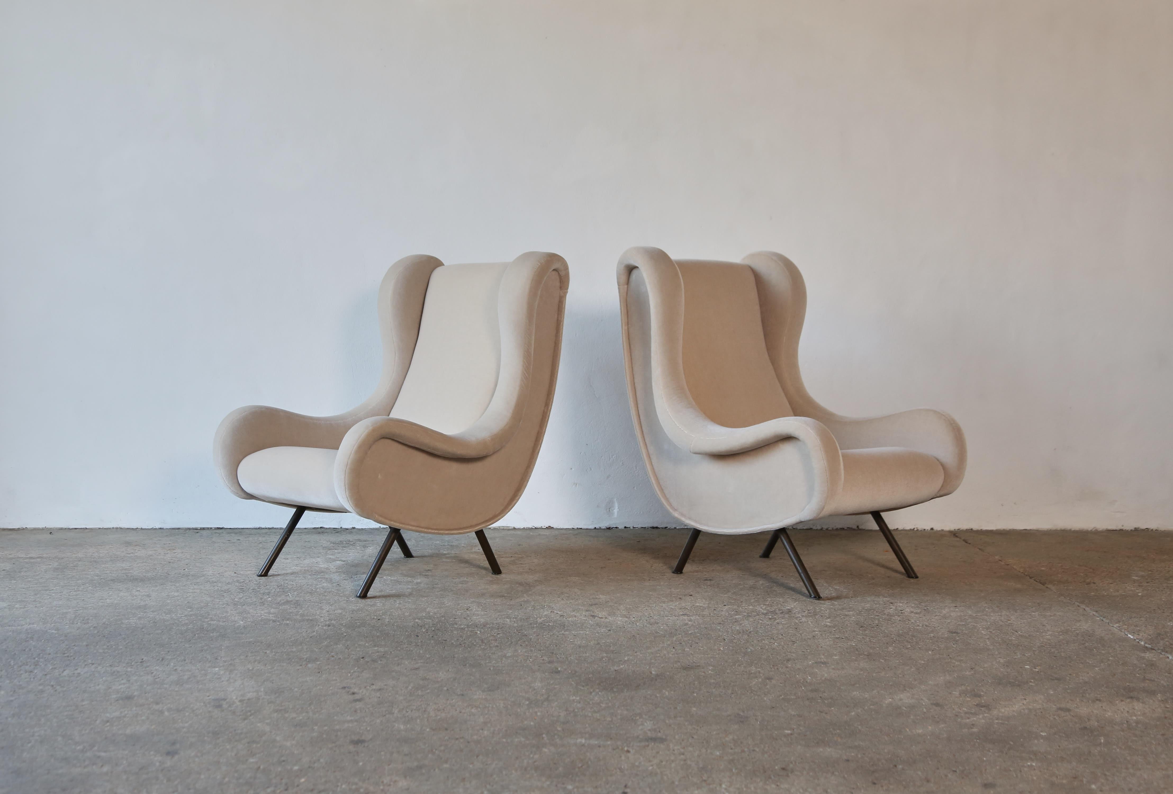 An pair of authentic marco zanuso senior chairs, Arflex, Italy, 1960s. These chairs have been reupholstered in a premium, ivory, 100% mohair velvet. Fast shipping worldwide.



