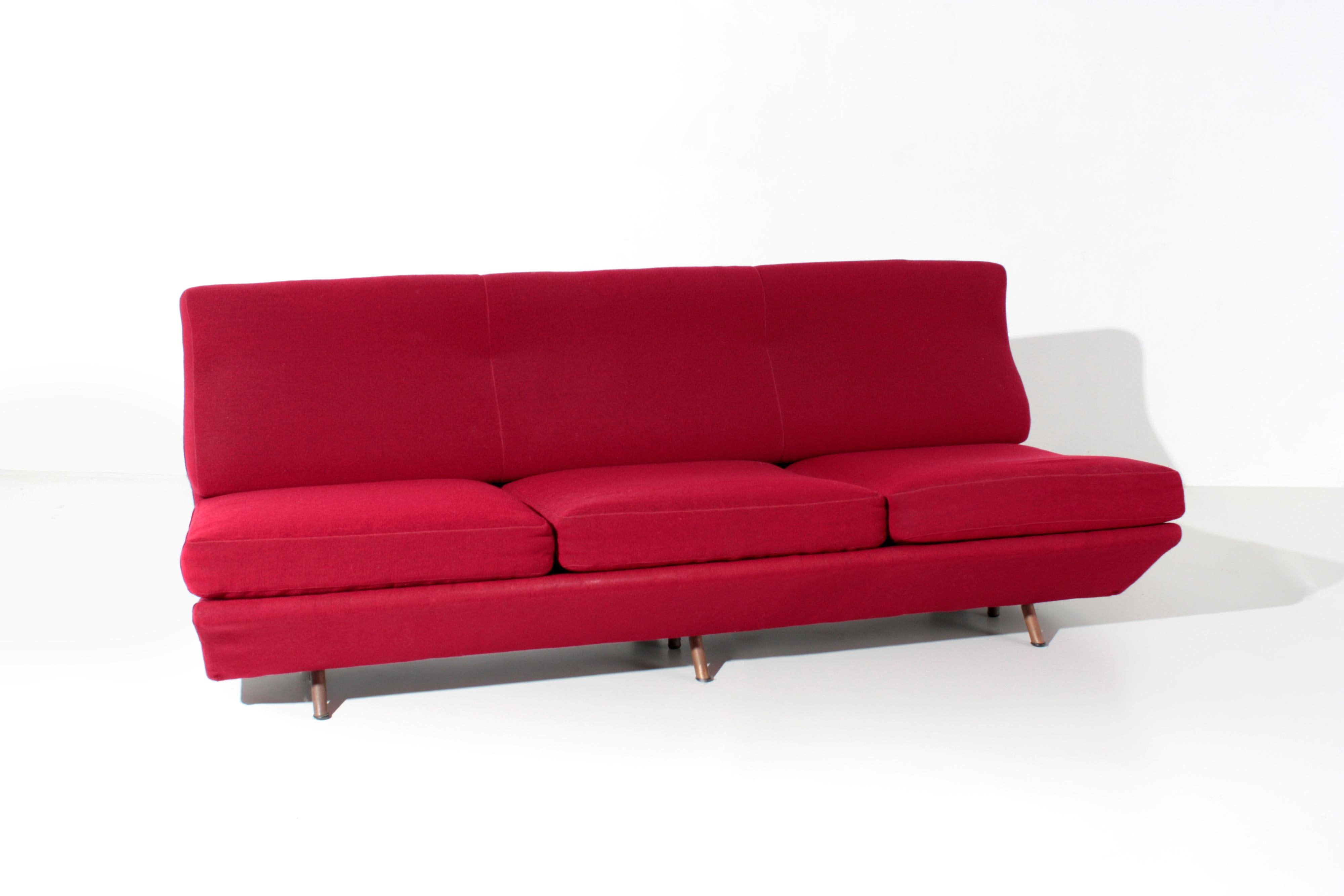 Marco Zanuso
Sleep-o-Matic sofa-bed, designed by Marco Zanuso with metal structure and mechanics, springing on elastic bands, red fabric upholstery. Brass feet. The sofa is in good condition, very light wear of the fabric.
Prod. Arflex, Italy,