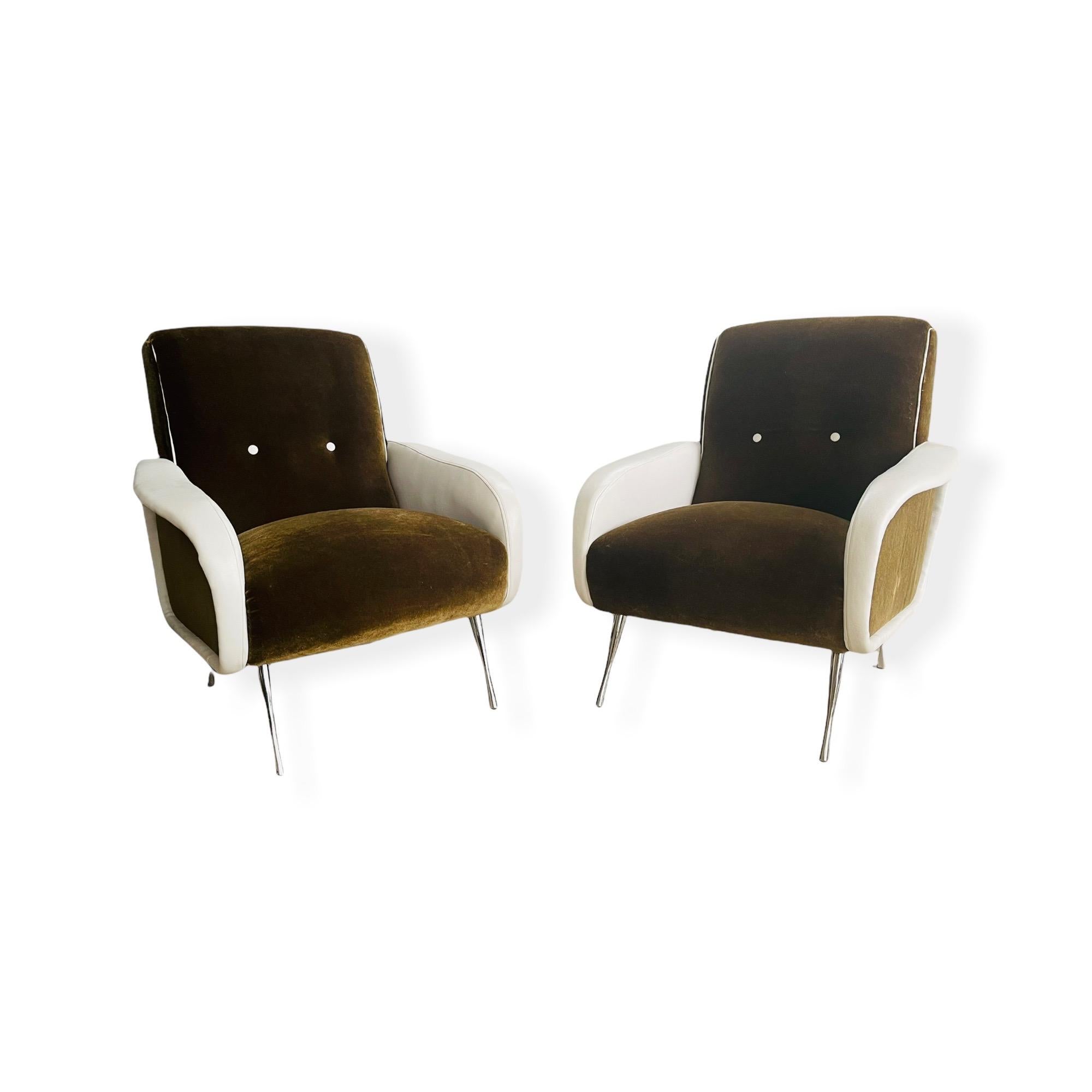 A beautiful pair of vintage Italian modern lounge chairs in style of Marco Zanuso. These comfy chairs have have beautiful tapered chrome legs with olive/brown upholstery and white vinyl arms. The chairs are in good vintage condition with normal wear