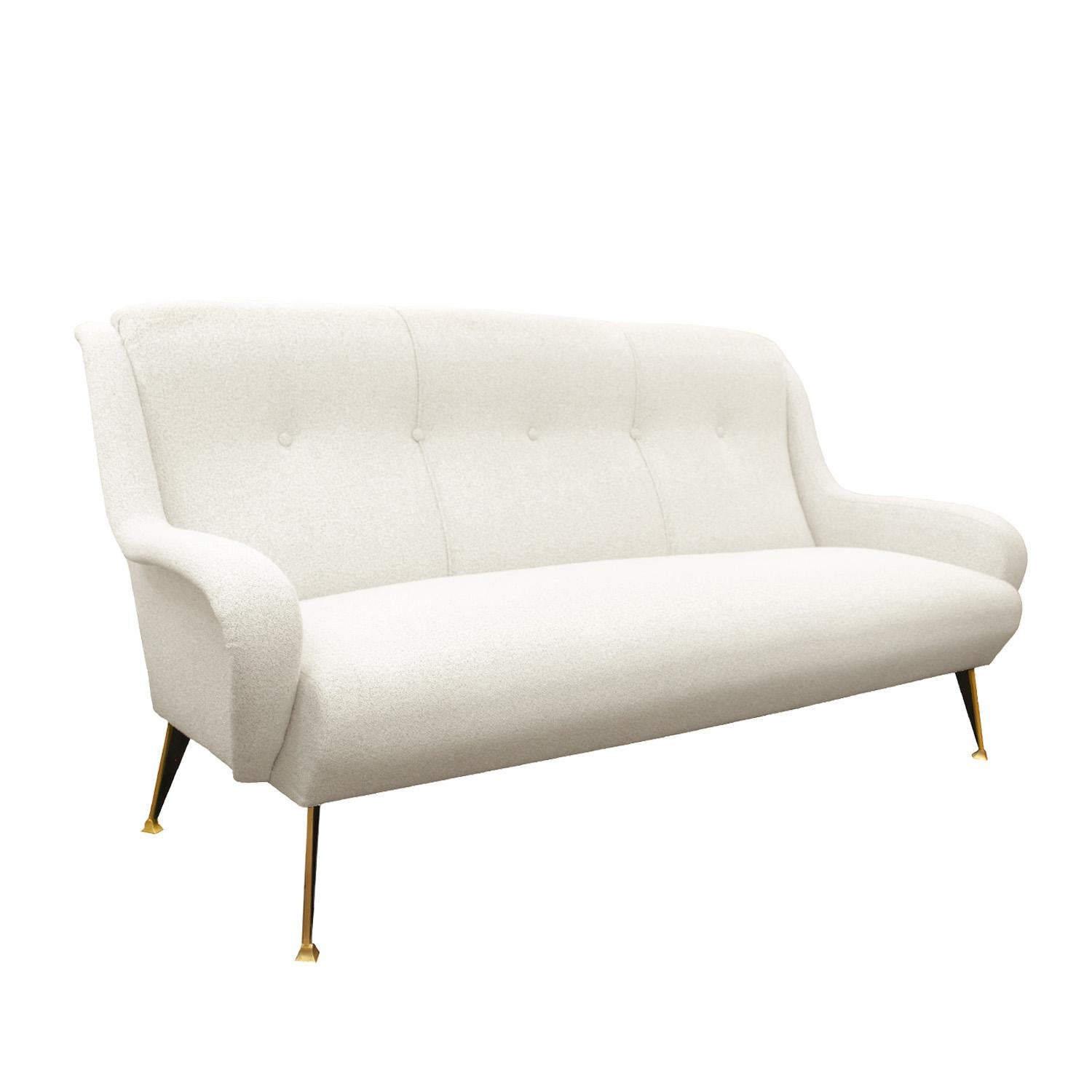 Chic Mid-Century Modern sofa with brass legs in the style of Marco Zanuso.
 Italy, 1960's. 

Newly upholstered in pebble color JAB indoor/outdoor fabric by Venfield.