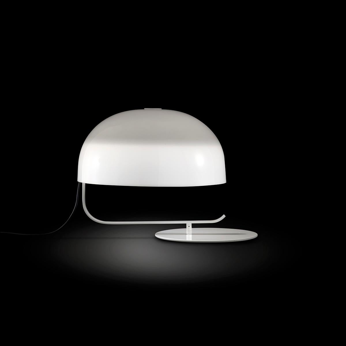 Table lamp 'Zanuso' designed by Marco Zanuso in 2013.
Table lamp giving diffused light. Opal PMMA diffuser rotating on the base. Painted metal curved support and base.
Manufactured by Oluce, Italy.

In 1963, Marco Zanuso designed the model 275 table