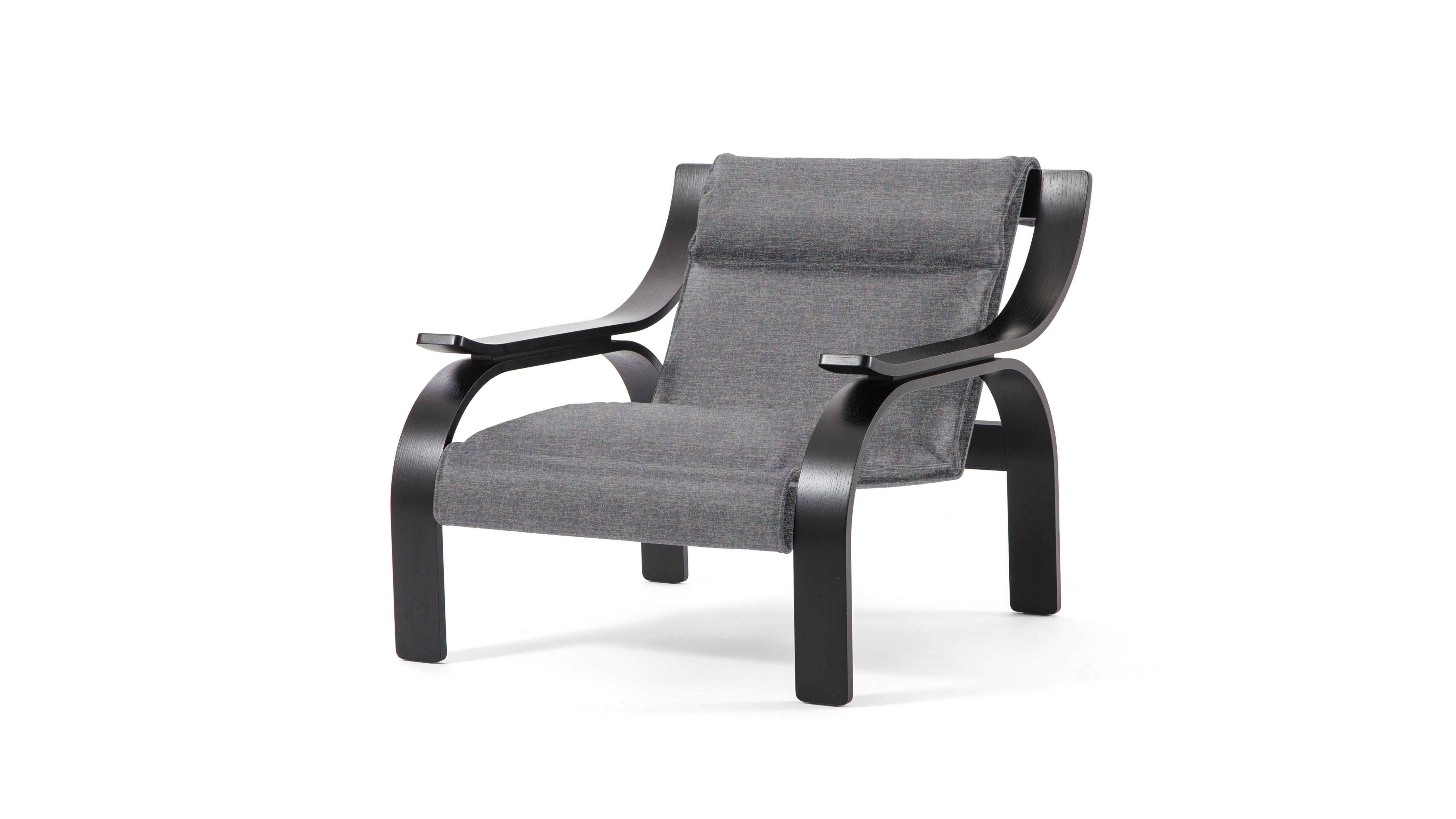 Marco Zanuso  Woodline Armchair For Cassina

Marco Zanuso’s exploration of support structures upon which to anchor the seat dates back to the design for an armchair entered in a MoMA international design competition in New York, in 1949.

Starting