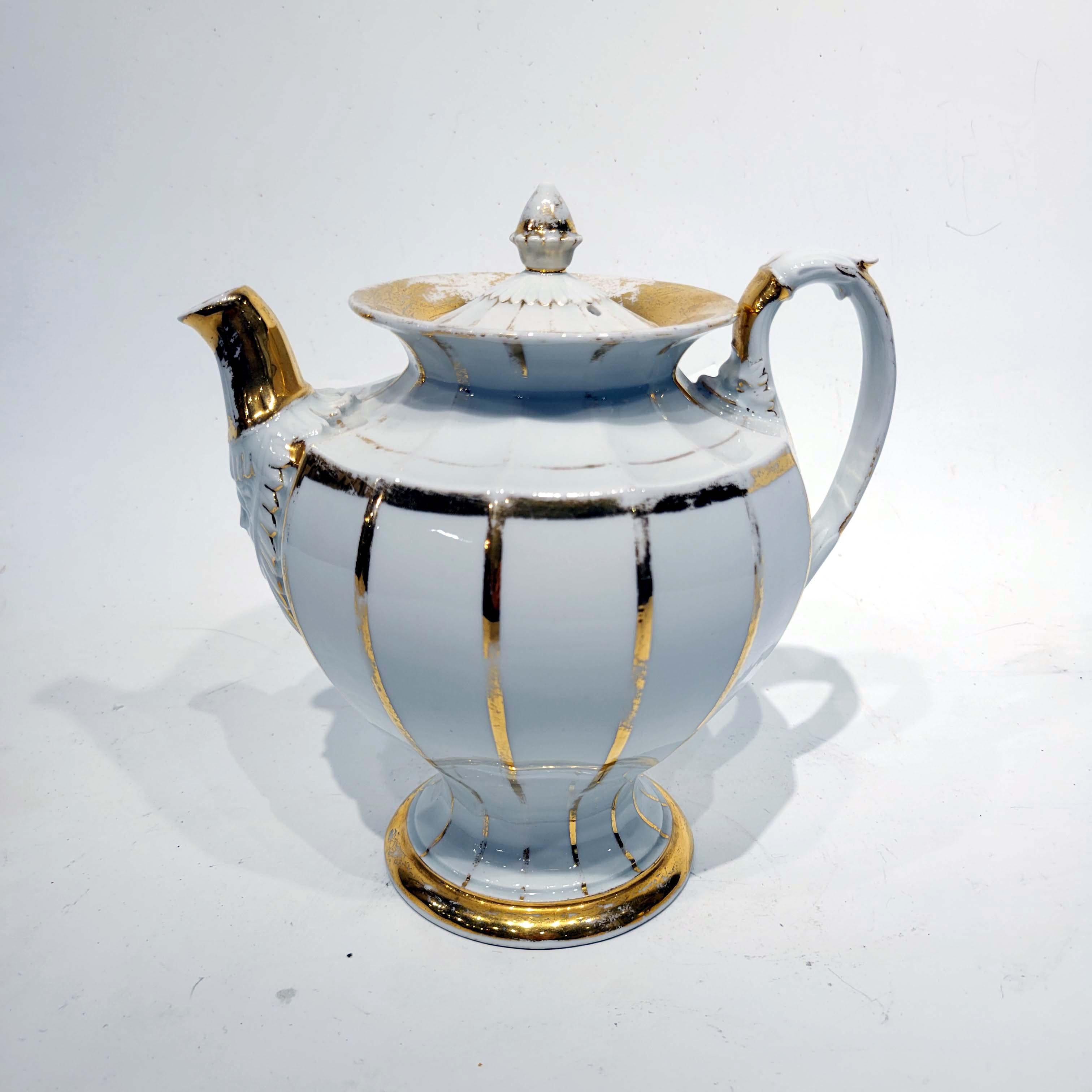 A wonderful first quality Meissen porcelain white porcelain coffee pot with gold decoration, circa 1810, Germany.
There is wear to the gilding, consistent with age and use, however there is no damage or repair.
  