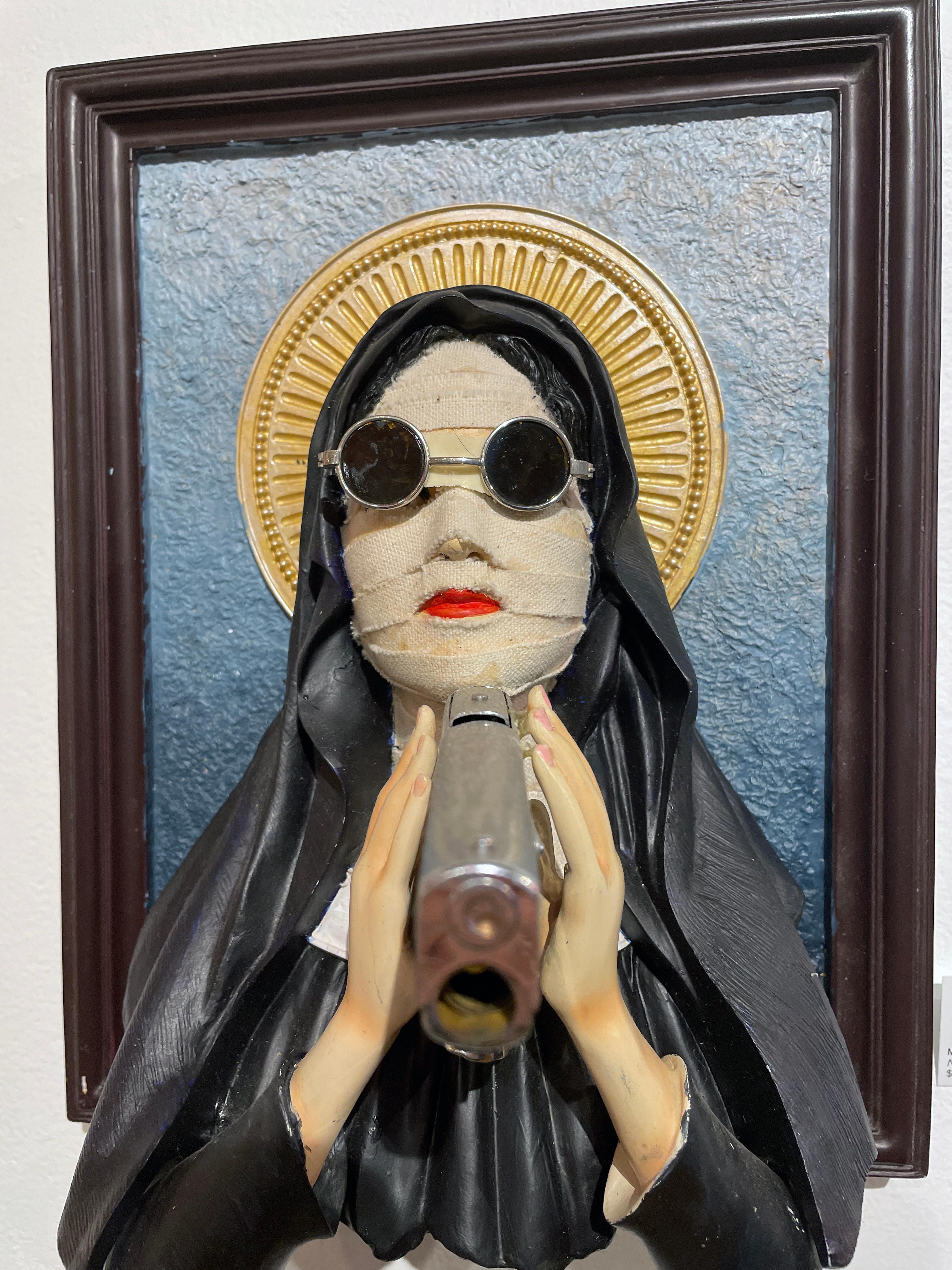 Nun with a Gun - Three Dimensional Sculptural Wall Piece - Contemporary Mixed Media Art by Marcos Raya