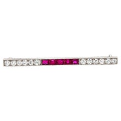 Marcus Art Deco Ruby Diamond and Platinum Bar Brooch, Circa 1925