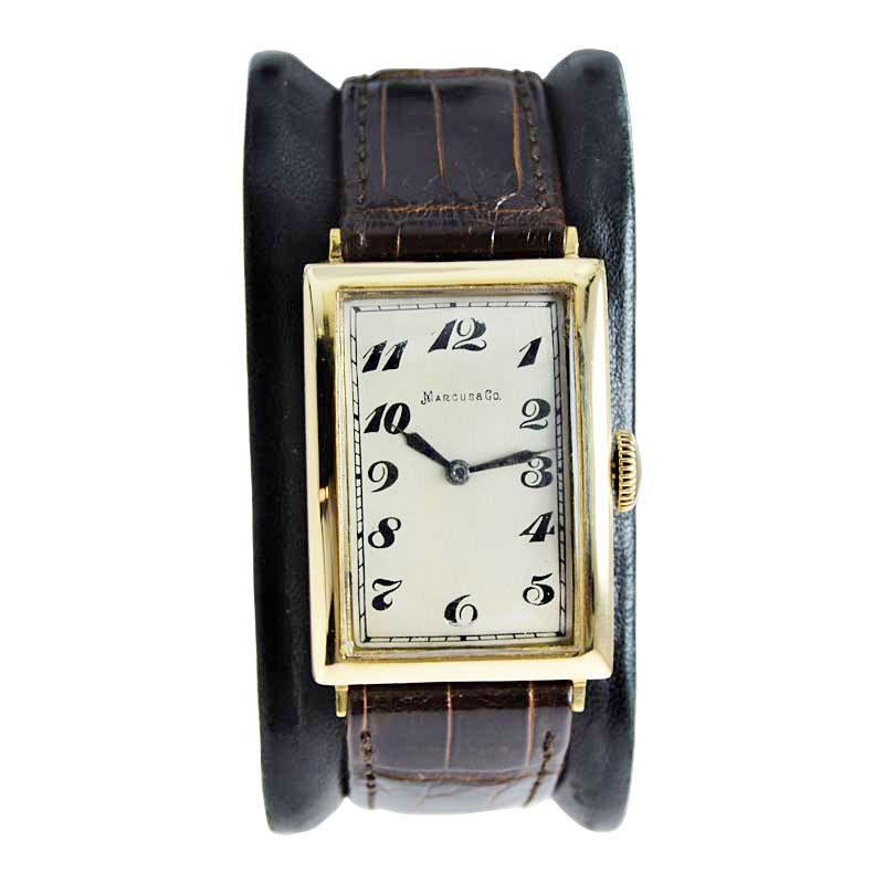 FACTORY / HOUSE: I.W.C. Schaffhausen for Marcus & Co.
STYLE / REFERENCE: Art Deco / Tank Style
METAL / MATERIAL: 18kt Yellow Gold
DIMENSIONS: Length 40mm X Width25mm
CIRCA: 1930's
MOVEMENT / CALIBER: Manual Winding / 19 Jewels 
DIAL / HANDS: