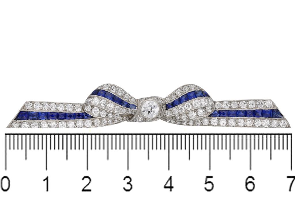 Old European Cut Marcus & Co. Sapphire and Diamond Bow Brooch, American, circa 1935 For Sale