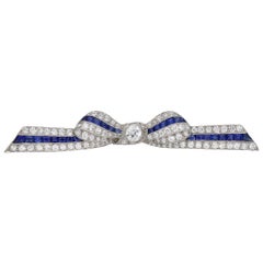 Marcus & Co. Sapphire and Diamond Bow Brooch, American, circa 1935