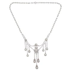 Marcus Natural Pearl Diamond and Platinum Necklace, Circa 1920