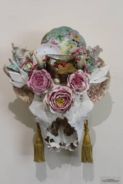"Horns of Dilemma" sculpture, skull, found objects, handmade porcelain flowers