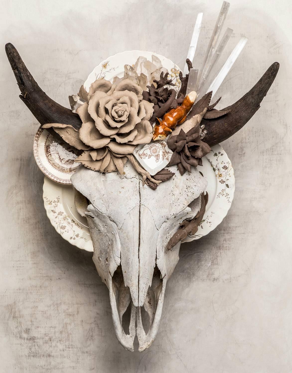 "Winter Solstice" sculpture, skull, found objects, handmade porcelain flowers - Sculpture by Marcy Lally