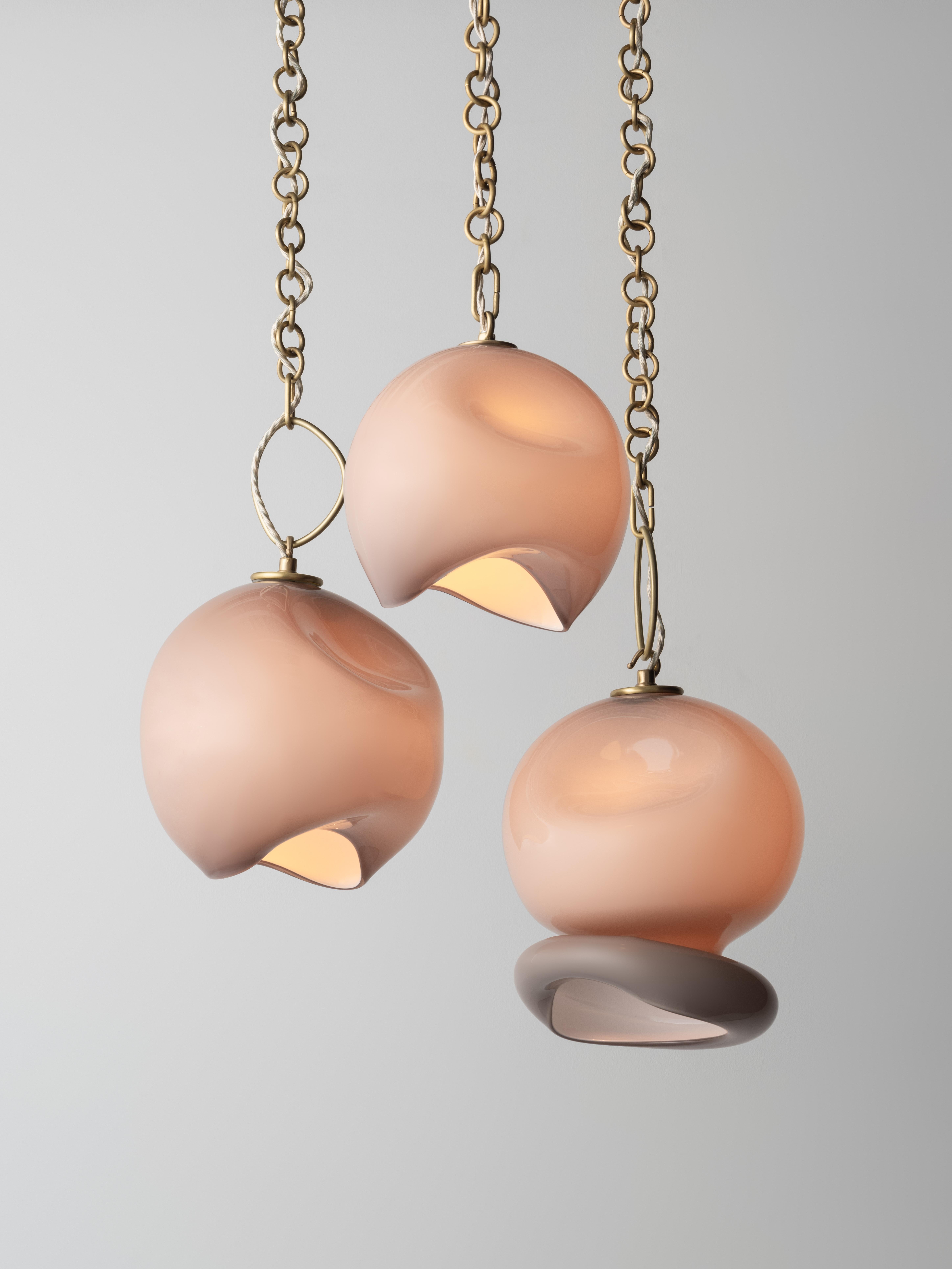 American Marea Five-Pendant Chandelier: Satin Brass/Amber Glass by Avram Rusu Studio For Sale