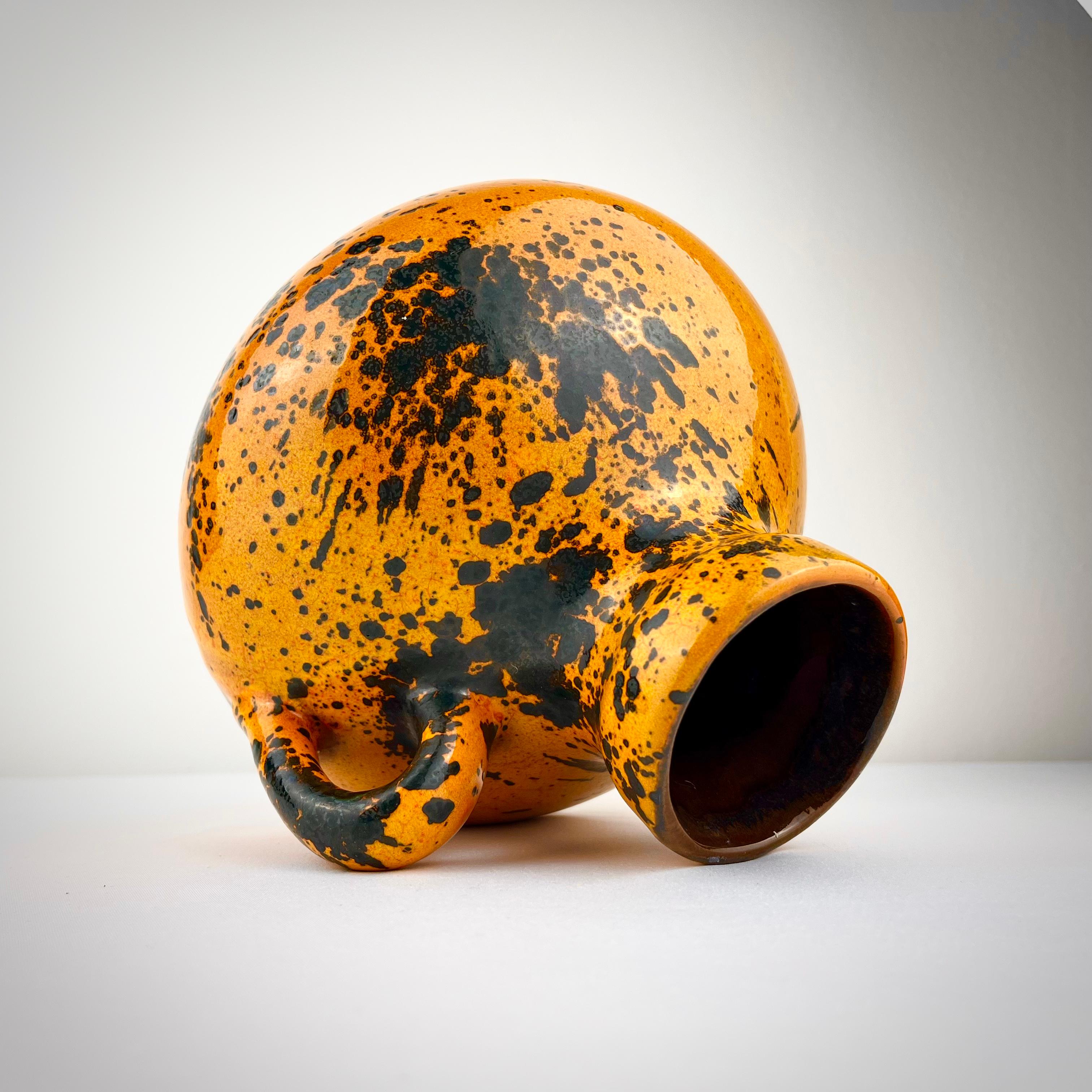 A large and vibrant Marei Keramik jug-vase, West Germany 1960s.
Form number 4302 in a rare yellow / orange and black graffiti splatter pop art glaze!
A really stylish and collectible vase in excellent condition with no chips, no cracks, no