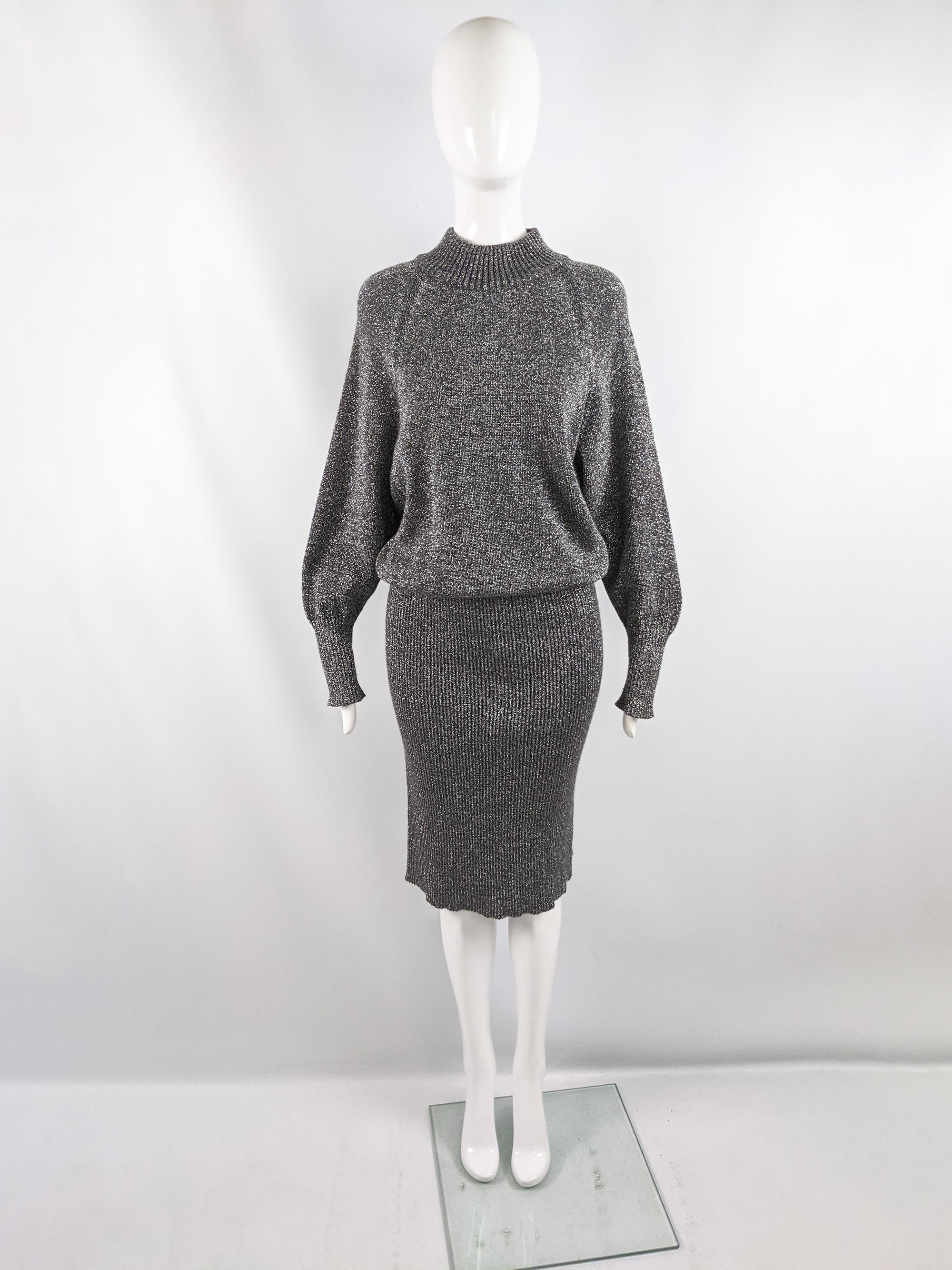 A fabulous vintage womens long sleeve sweater dress from the 80s by luxury Italian fashion house, Max Mara for their Marella line. Made in Italy, from a metallic silver wool and lurex knit fabric with a mock neck, ribbed fitted pencil skirt and