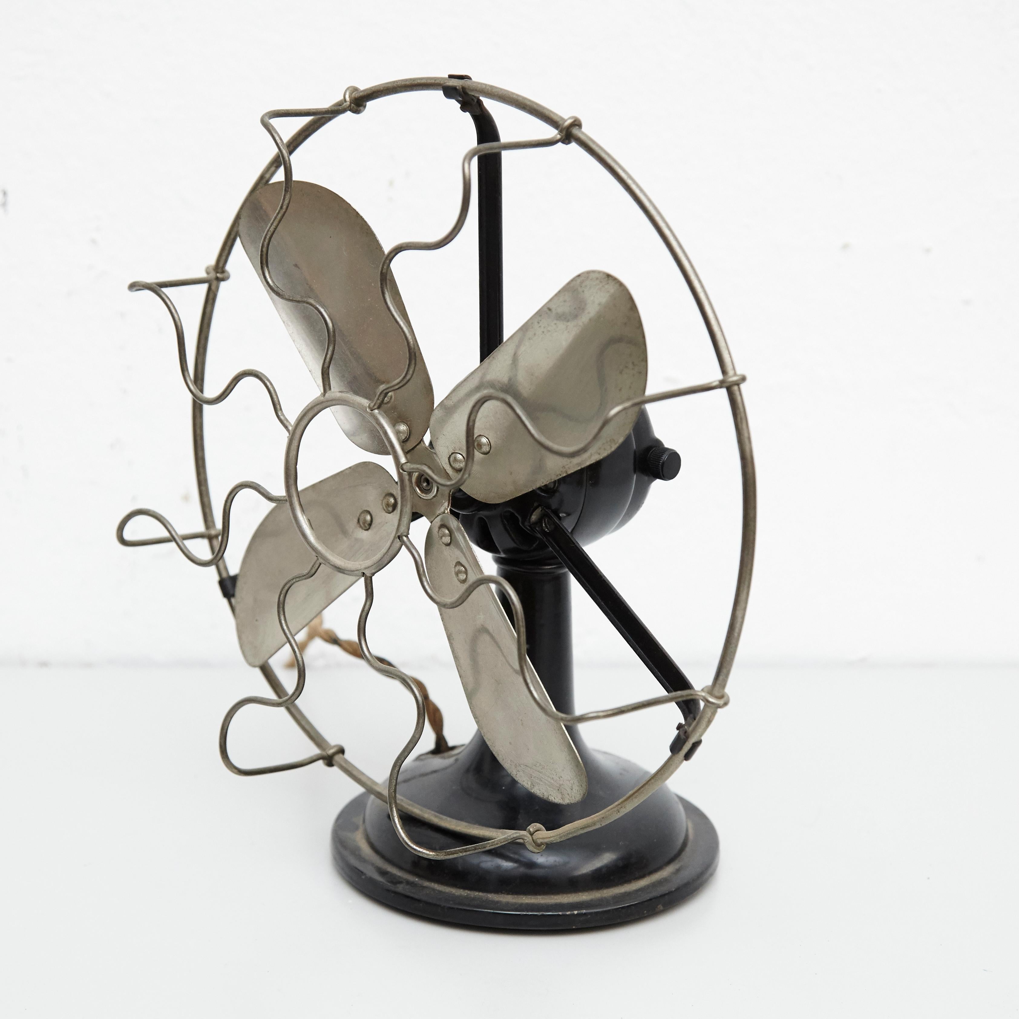 Marelli fan.
Manufactured by Marelli, Italy, circa 1940.

In original condition, with minor wear consistent of age and use, preserving a beautiful patina.
The mechanical condition of the fan hasn't been