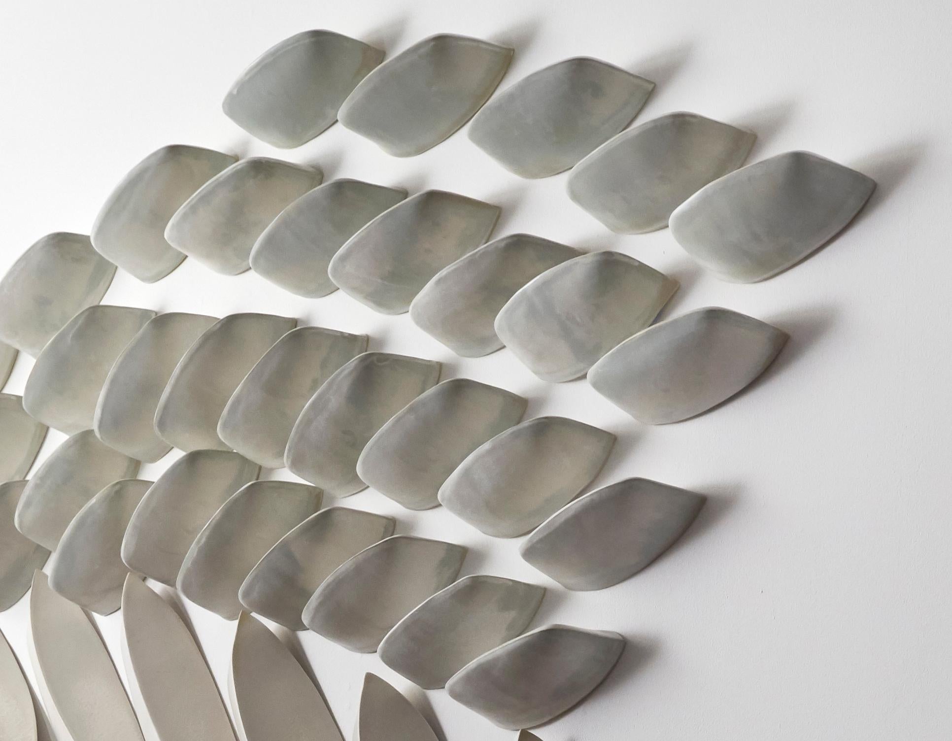 Maren Kloppmann (alemana, nacida en 1962) es una artista de la cerámica que vive y trabaja en Minneapolis, Minnesota. Serena en la paleta y refinada en la forma, la obra de Kloppmann logra un elegante equilibrio: en sus palabras, 