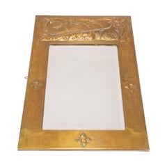 Margaret Gilmour, attri. An Arts and Crafts Glasgow School brass mirror