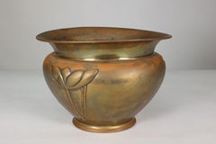 Margaret Gilmour school. A Glasgow style brass planter w. stylised floral detail