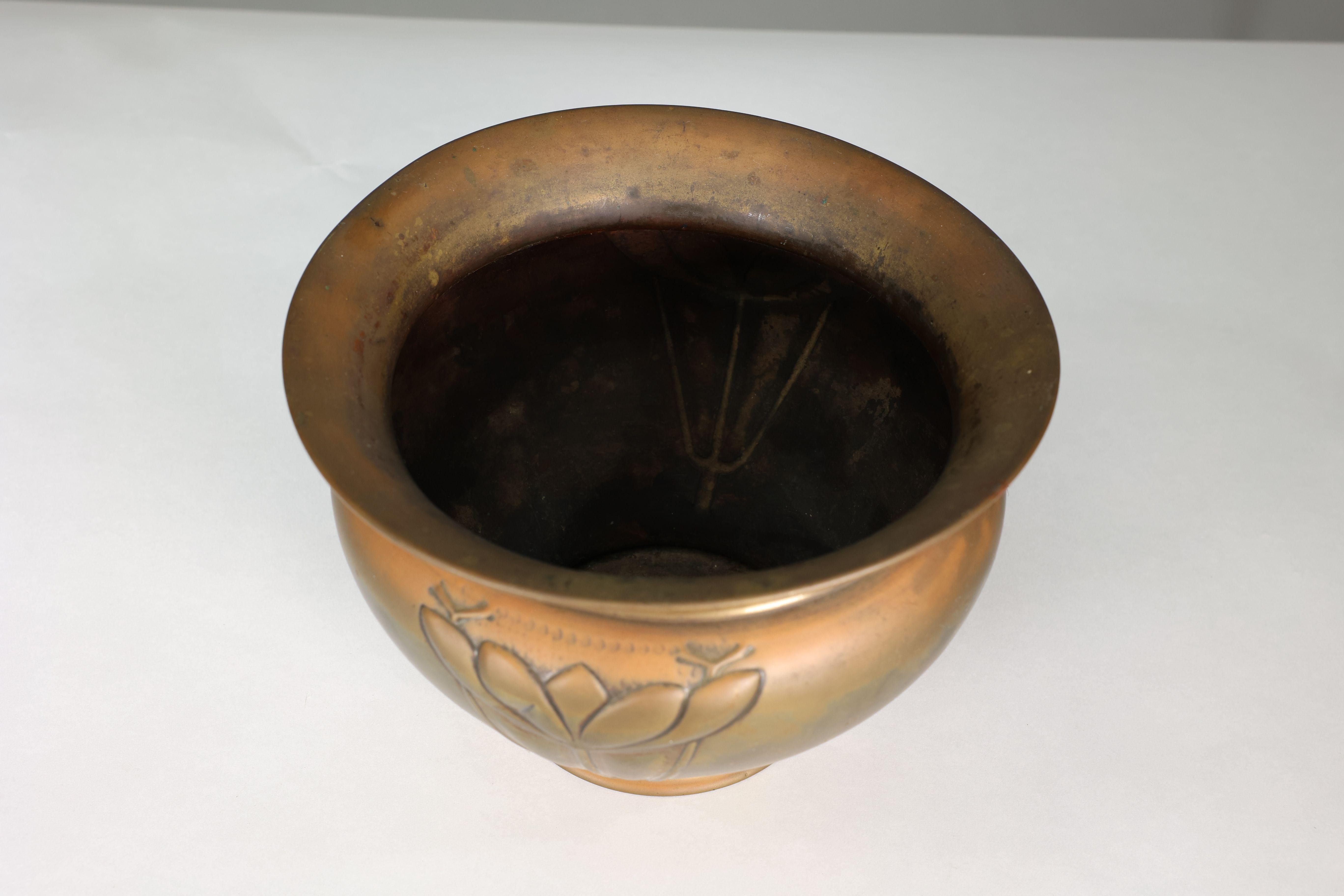Margaret Gilmour school. A Glasgow style brass planter w. stylised floral detail 1