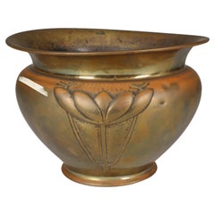 Antique Margaret Gilmour school. A Glasgow style brass planter w. stylised floral detail