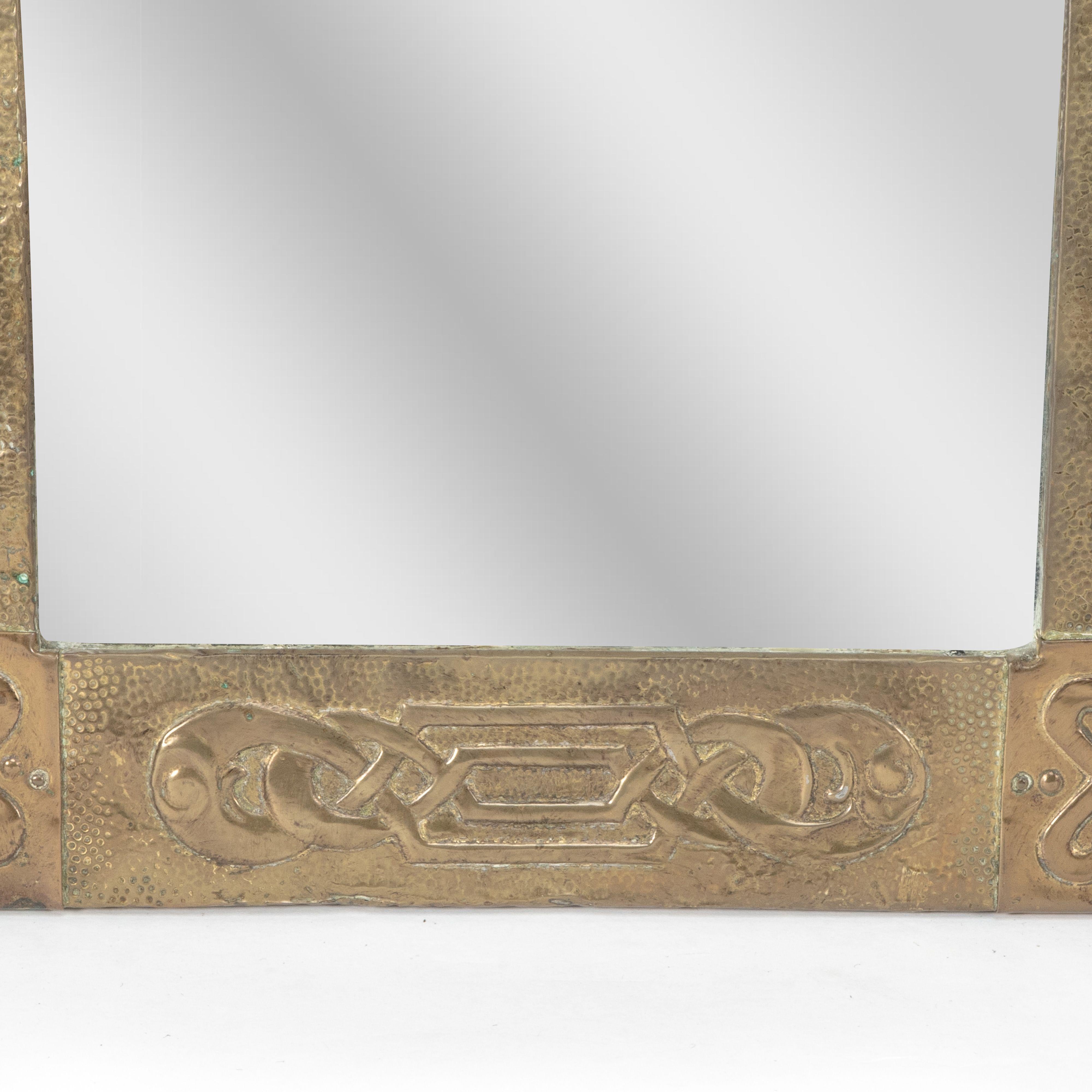Margaret Gilmour School. An Arts and Crafts oblong brass mirror 5