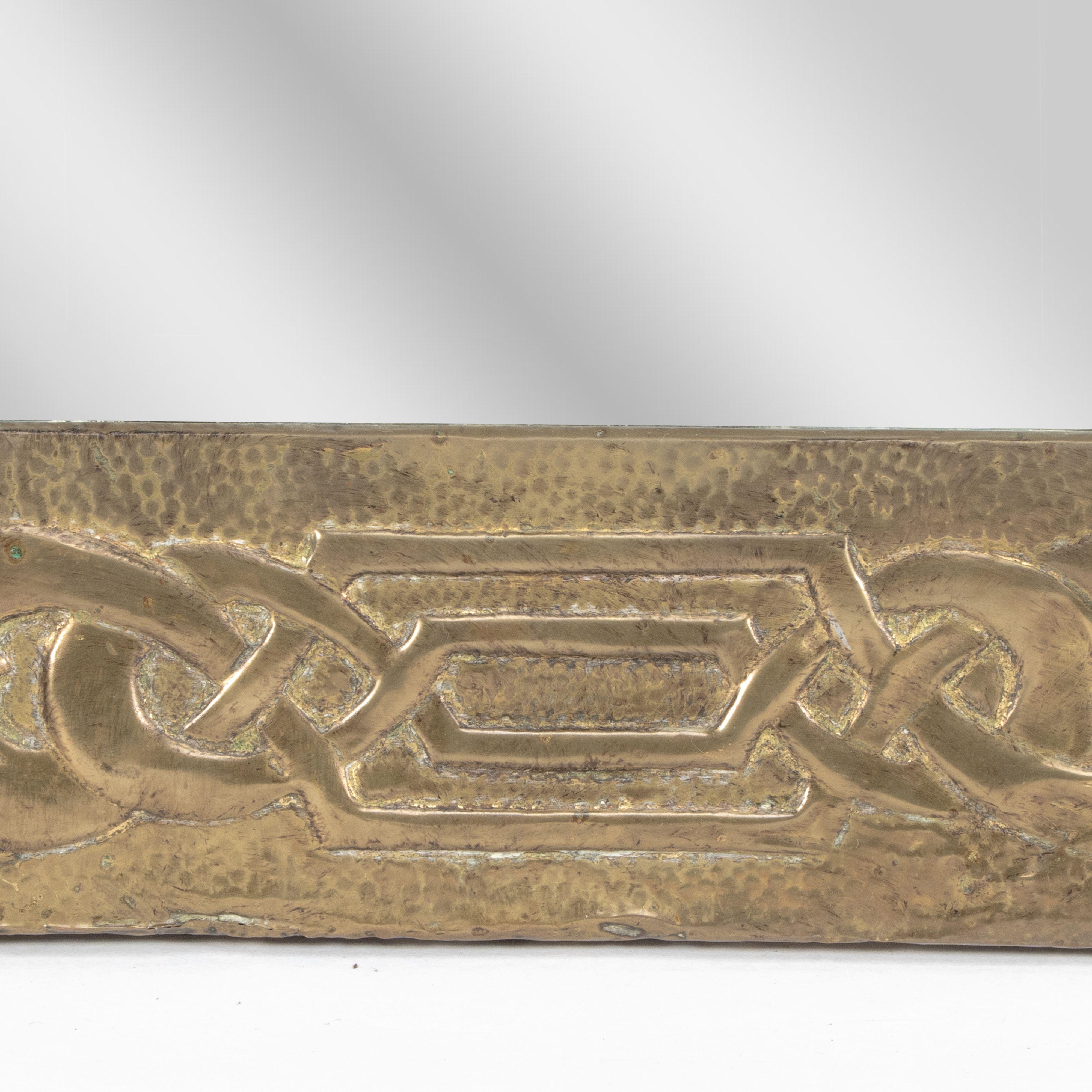 Margaret Gilmour School. An Arts and Crafts oblong brass mirror 6