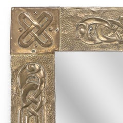 Margaret Gilmour School. An Arts and Crafts oblong brass mirror