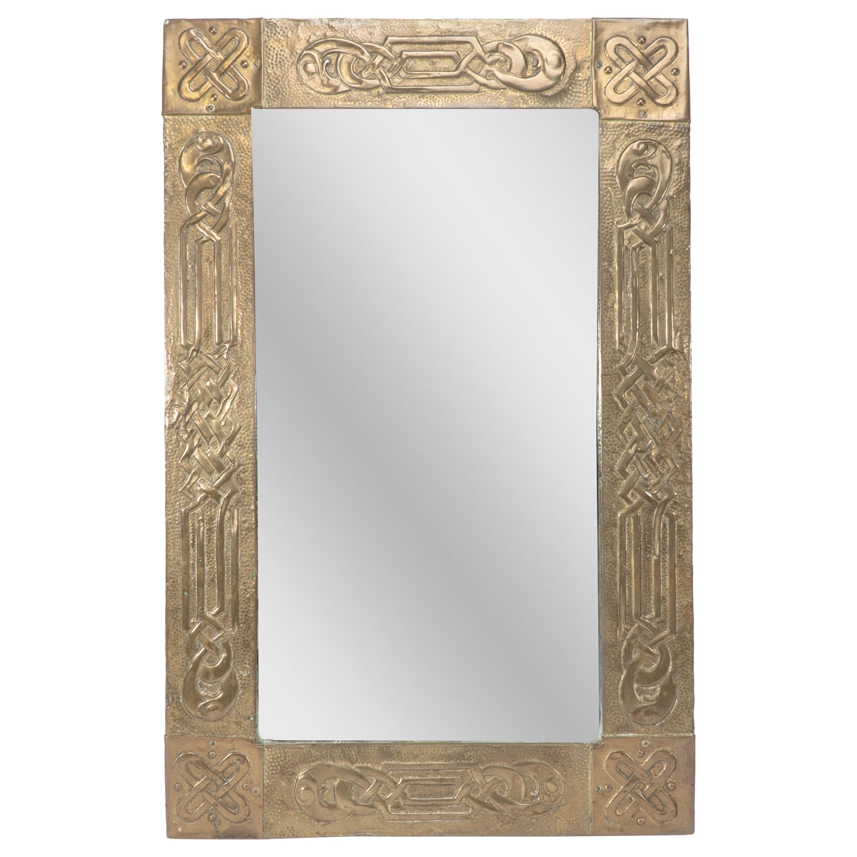 Margaret Gilmour School. An Arts and Crafts oblong brass mirror