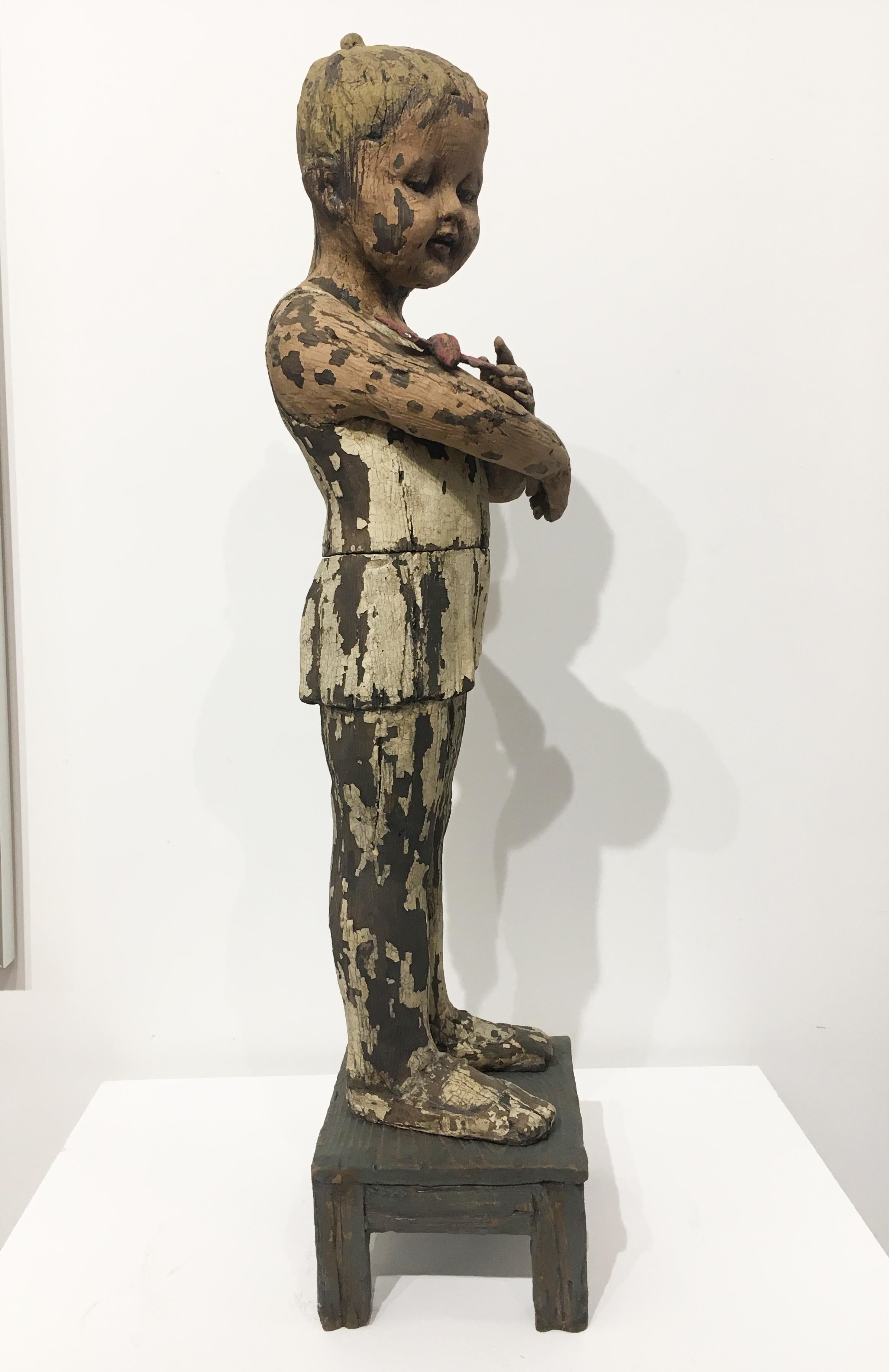 Margaret Keelan’s figurative sculptures confront issues of mortality, decay, beauty, aging, and innocence. The faces are based on nineteenth century dolls, yet their contemporary styling and decayed surfaces disconnect them from time and place. What
